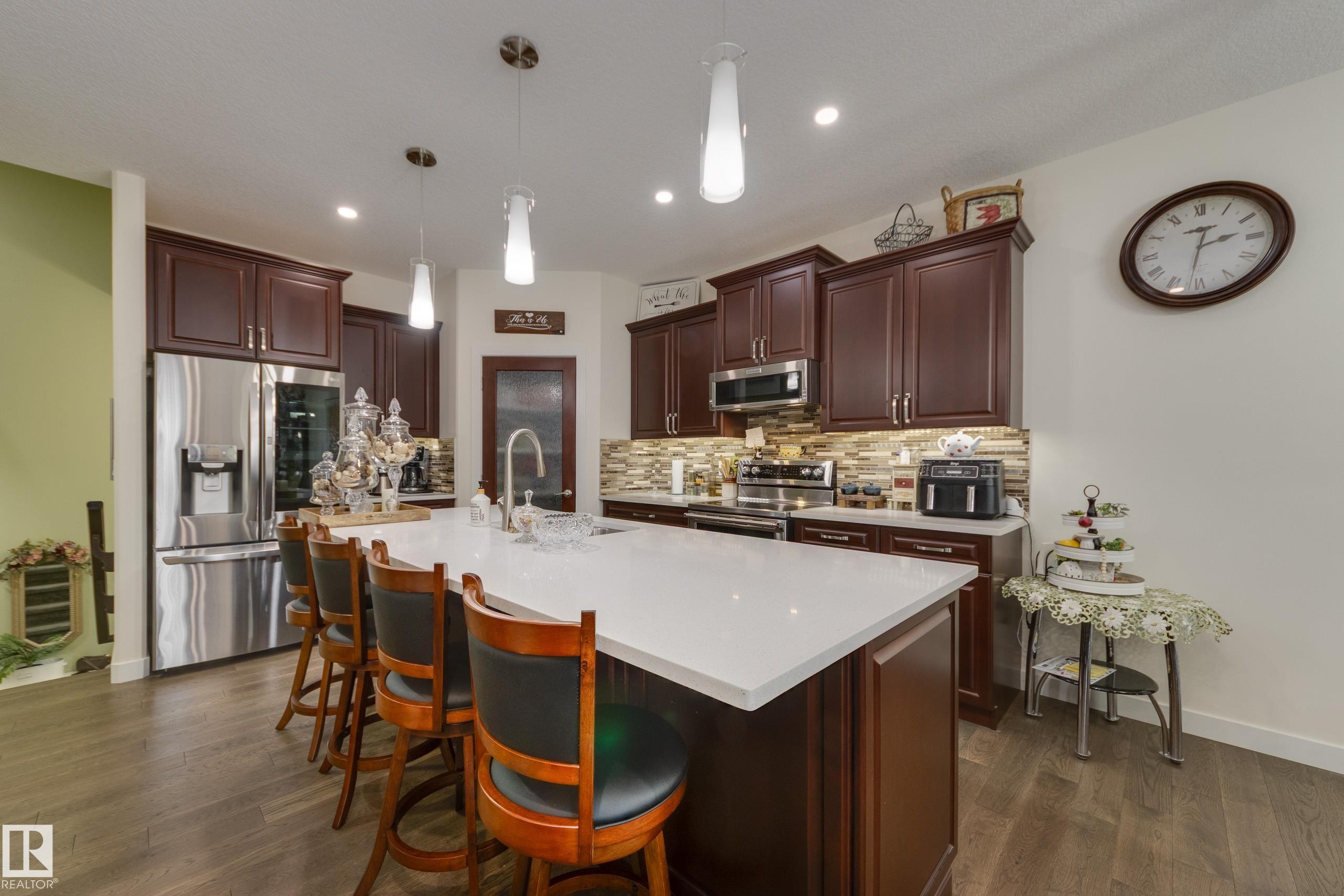 64 Maple Crescent, Gibbons, AB - Indoor Photo Showing Kitchen With Upgraded Kitchen