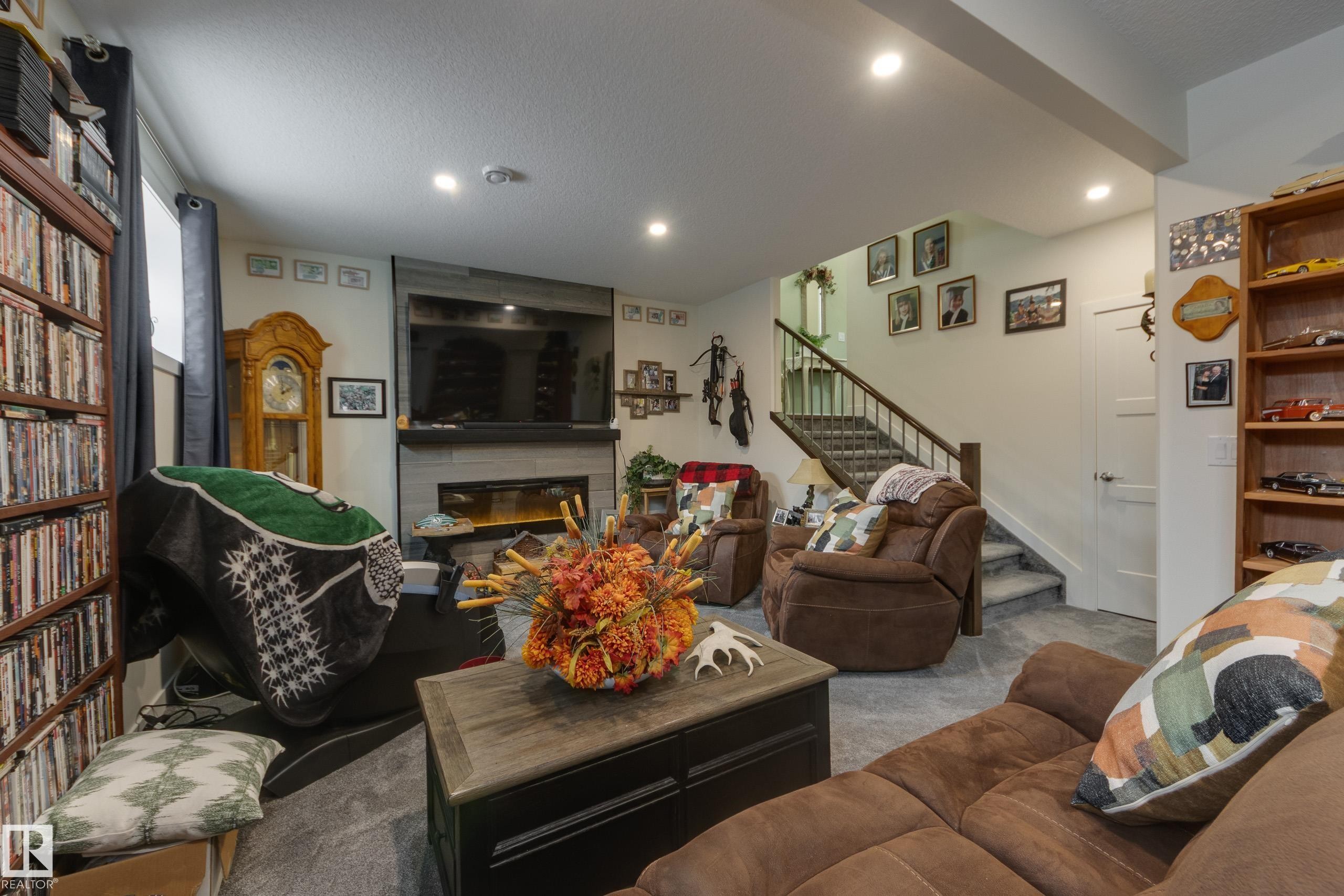 64 Maple Crescent, Gibbons, AB - Indoor With Fireplace