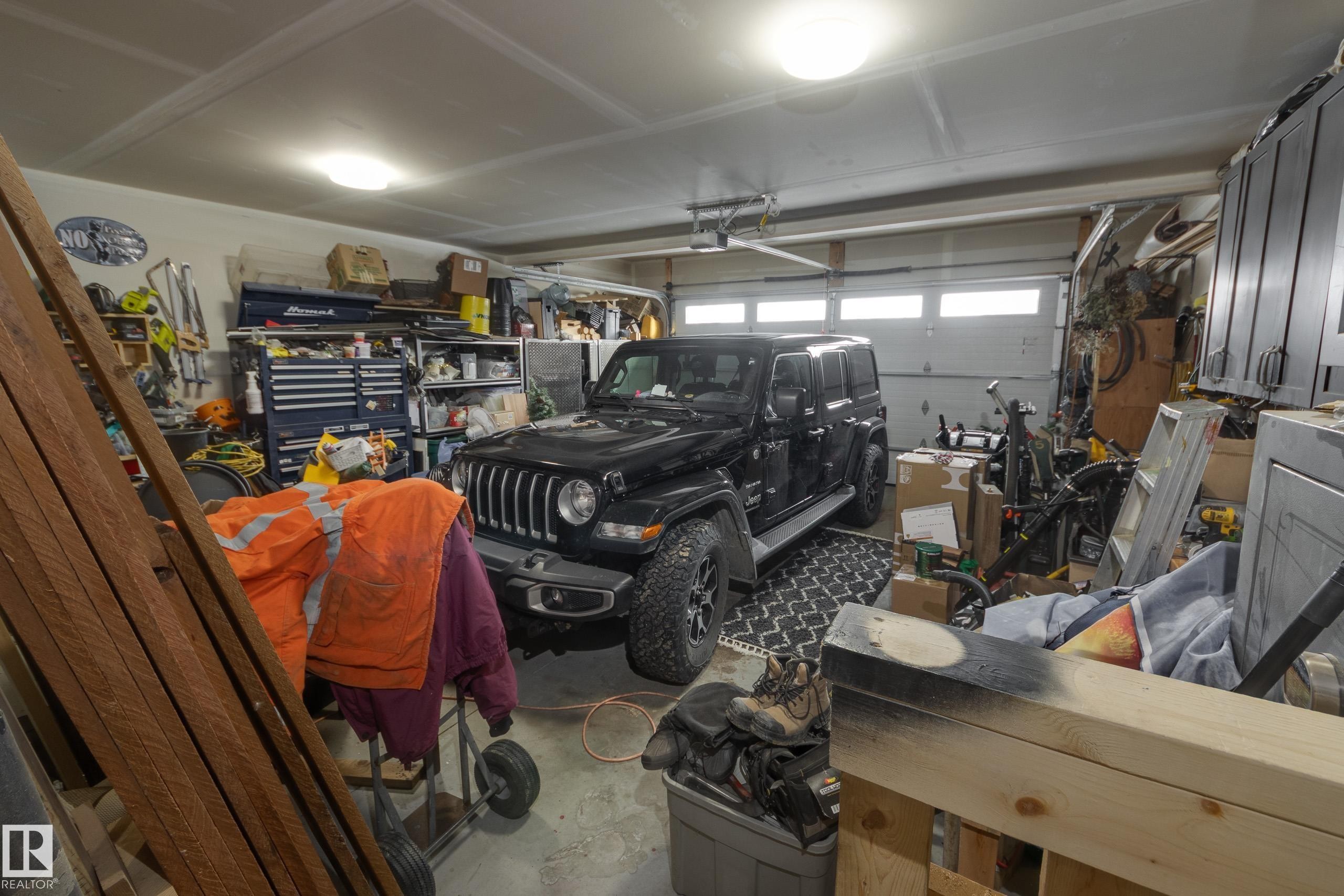 64 Maple Crescent, Gibbons, AB - Indoor Photo Showing Garage