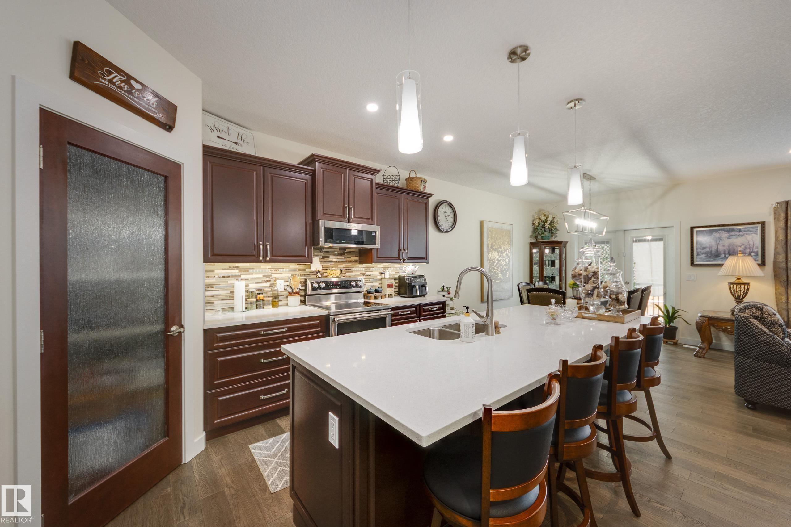 64 Maple Crescent, Gibbons, AB - Indoor Photo Showing Kitchen With Double Sink With Upgraded Kitchen
