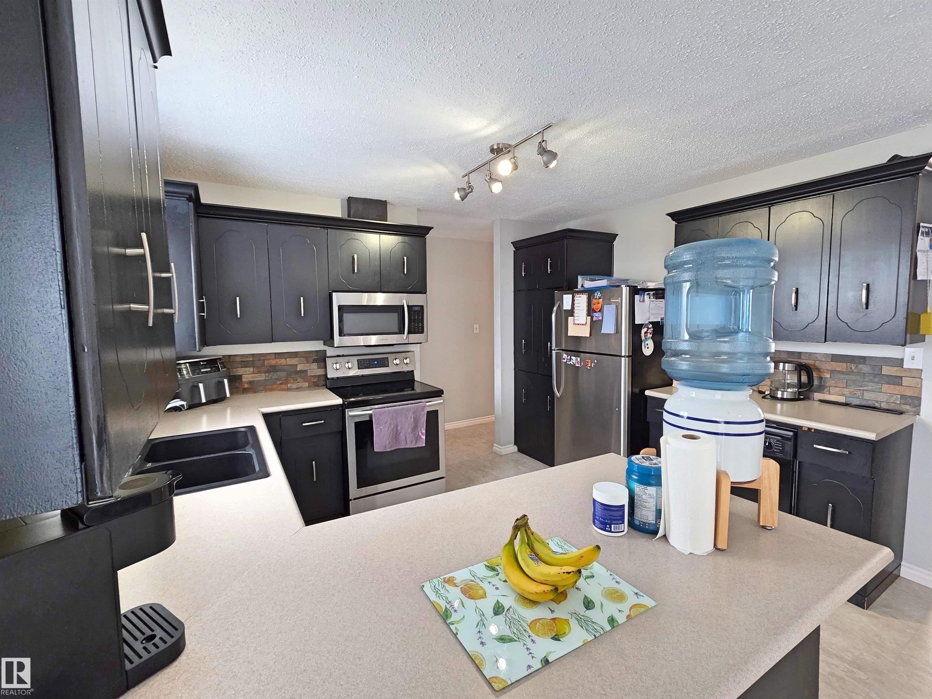 5614 52 Avenue, St. Paul Town, AB - Indoor Photo Showing Kitchen With Double Sink
