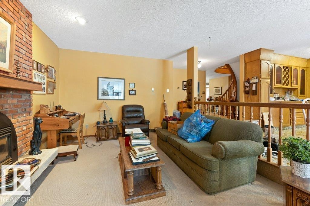 10511 74 Street, Edmonton, AB - Indoor Photo Showing Living Room With Fireplace