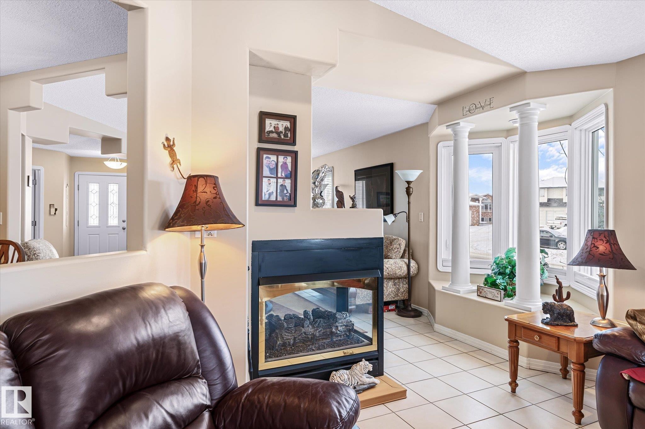 7020 157 Avenue, Edmonton, AB - Indoor Photo Showing Living Room With Fireplace