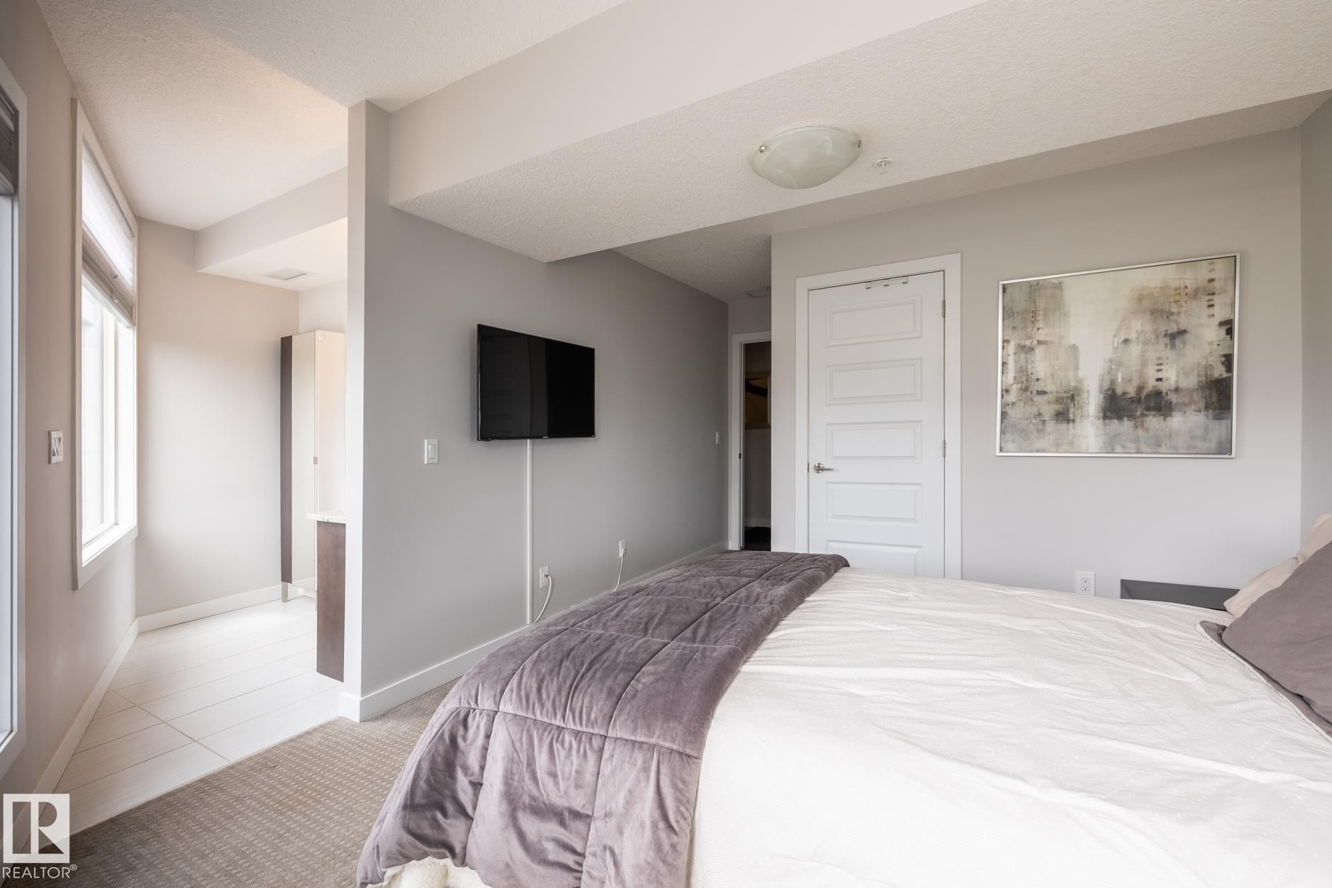 122 5151 Windermere Boulevard, Edmonton, AB - Indoor Photo Showing Bedroom