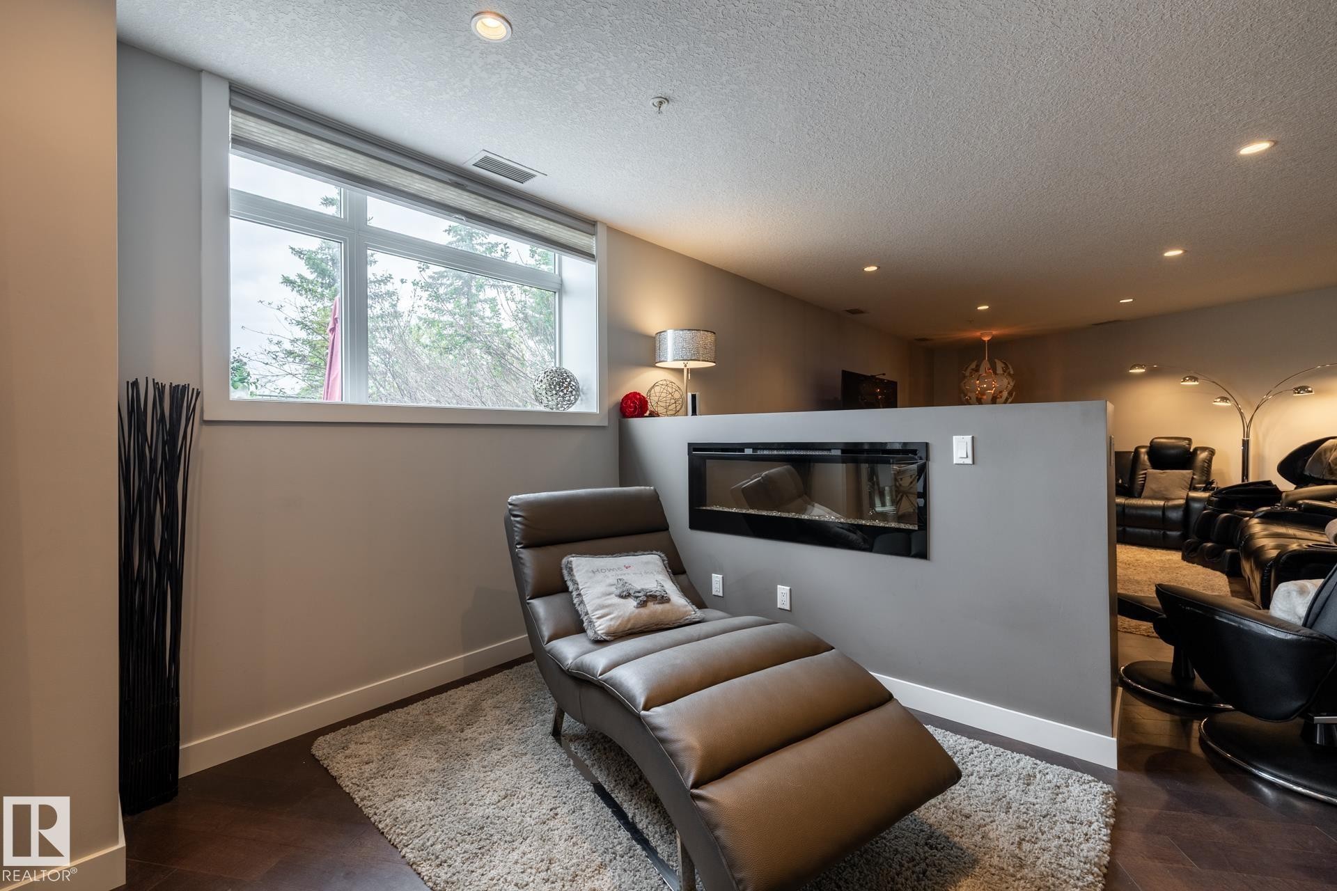 122 5151 Windermere Boulevard, Edmonton, AB - Indoor With Fireplace
