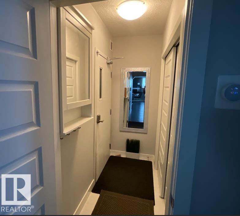 122 5151 Windermere Boulevard, Edmonton, AB - Indoor Photo Showing Other Room