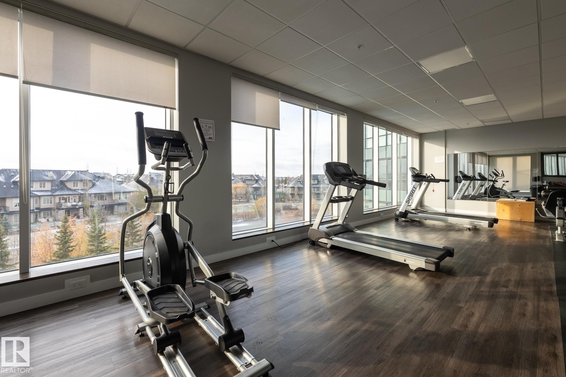 122 5151 Windermere Boulevard, Edmonton, AB - Indoor Photo Showing Gym Room