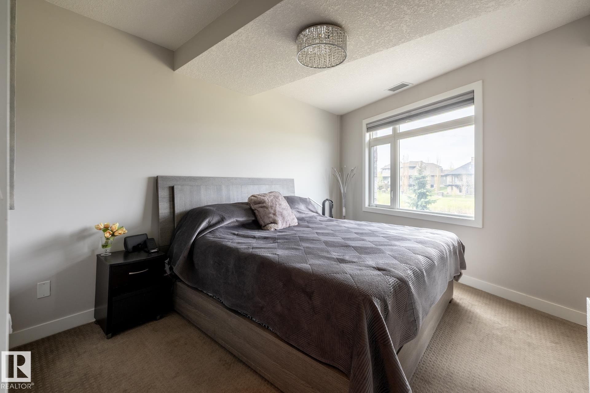 122 5151 Windermere Boulevard, Edmonton, AB - Indoor Photo Showing Bedroom