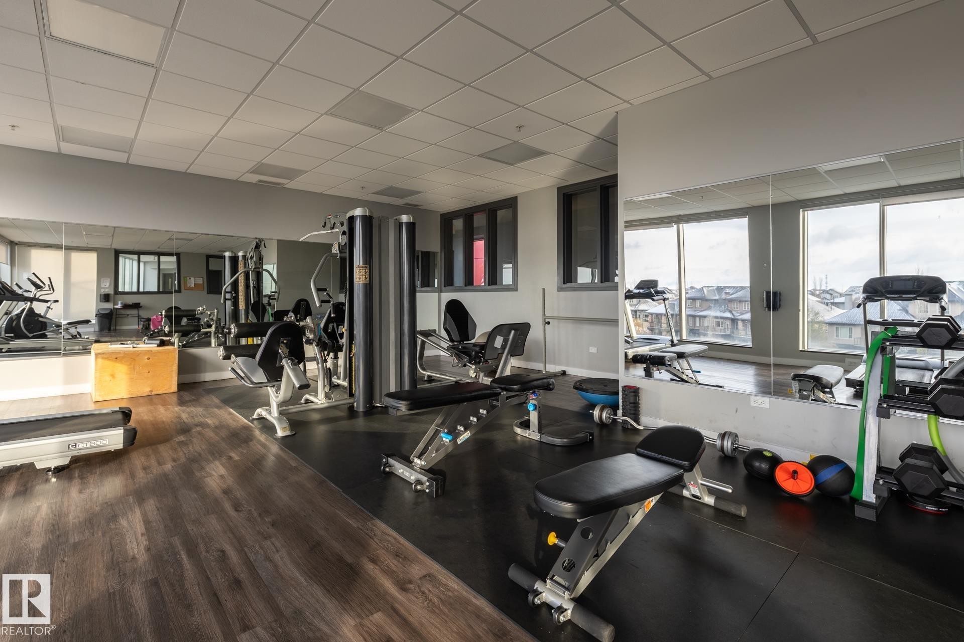 122 5151 Windermere Boulevard, Edmonton, AB - Indoor Photo Showing Gym Room