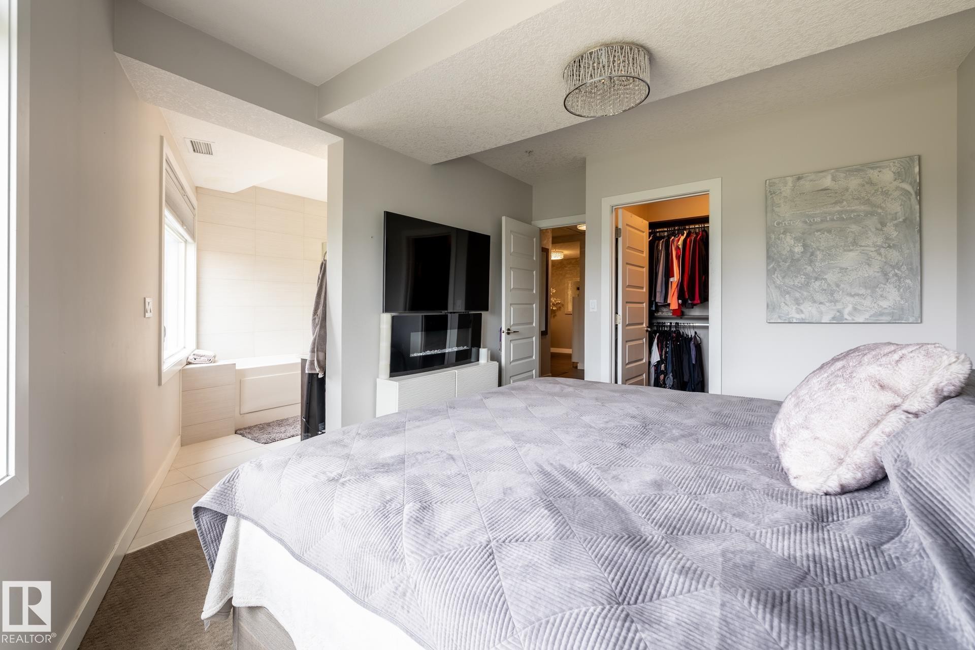 122 5151 Windermere Boulevard, Edmonton, AB - Indoor Photo Showing Bedroom