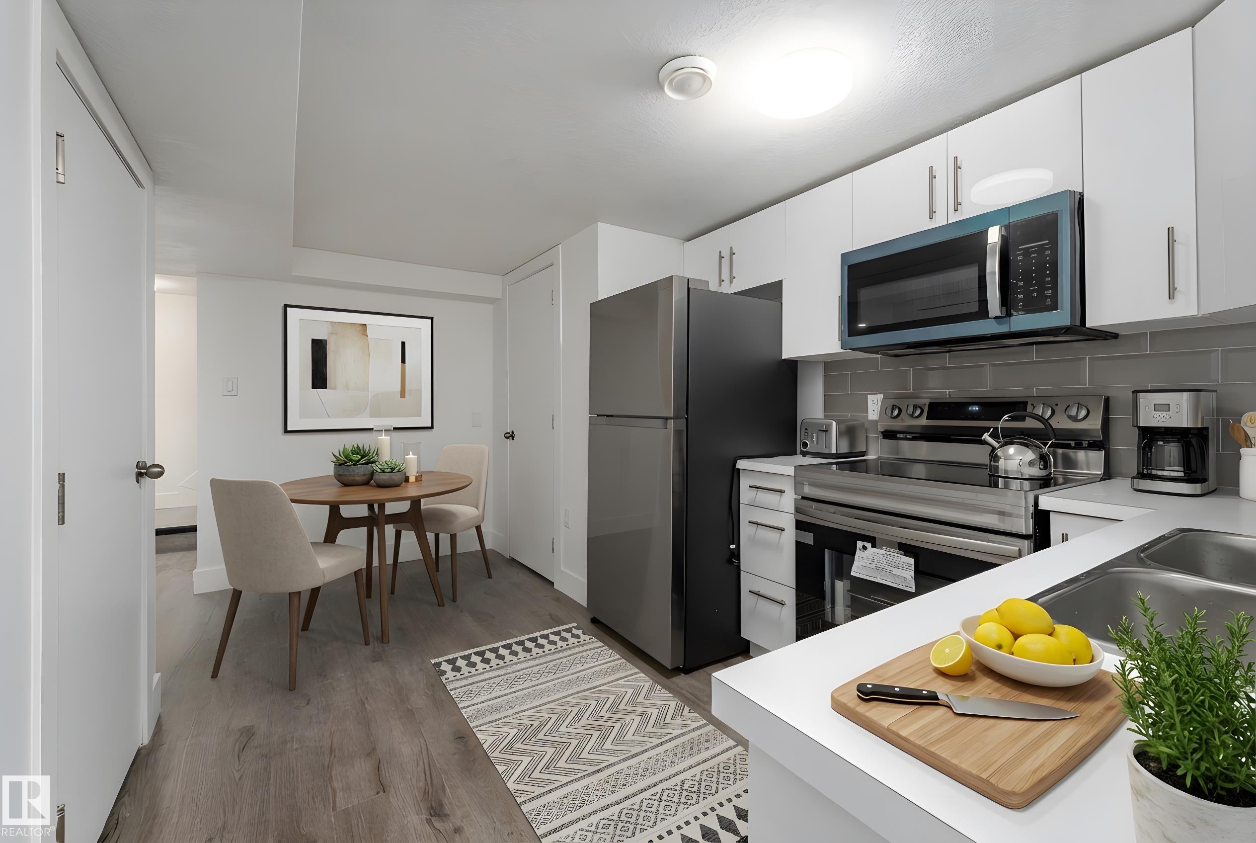 10519 40 Street, Edmonton, AB - Indoor Photo Showing Kitchen With Double Sink