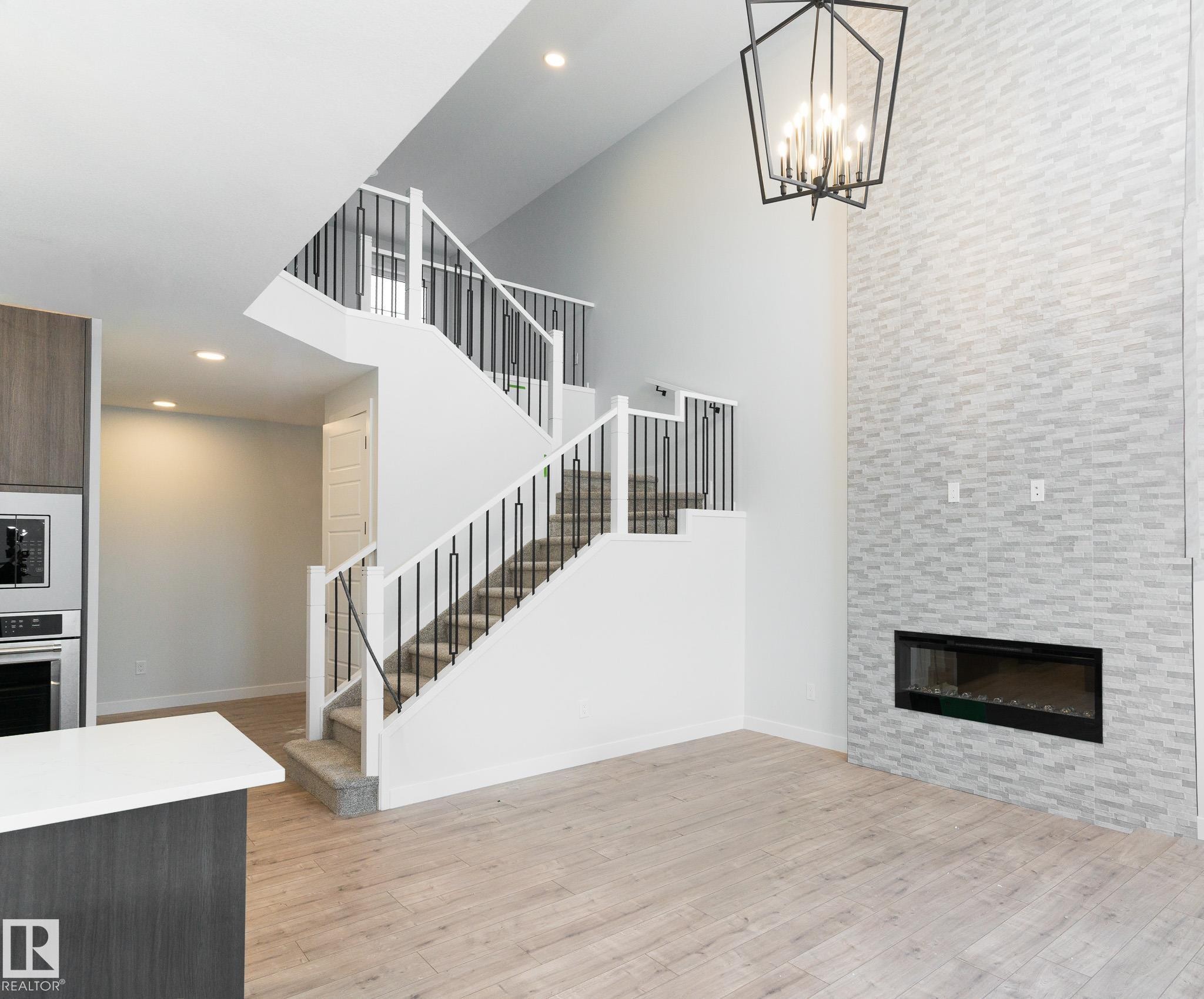 285 Glenridding Ravine Road, Edmonton, AB - Indoor With Fireplace
