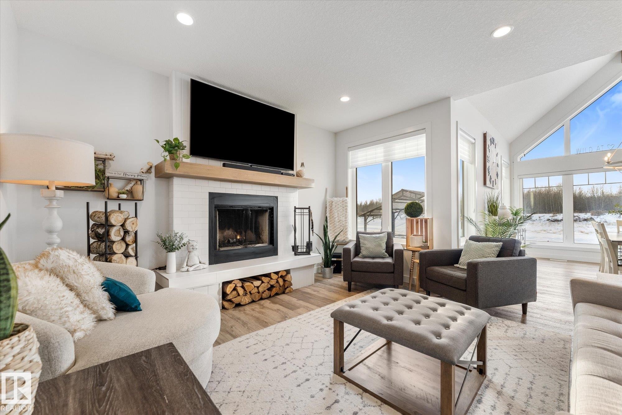 18 3410 Ste. Anne Trail, Rural Lac Ste. Anne County, AB - Indoor Photo Showing Living Room With Fireplace