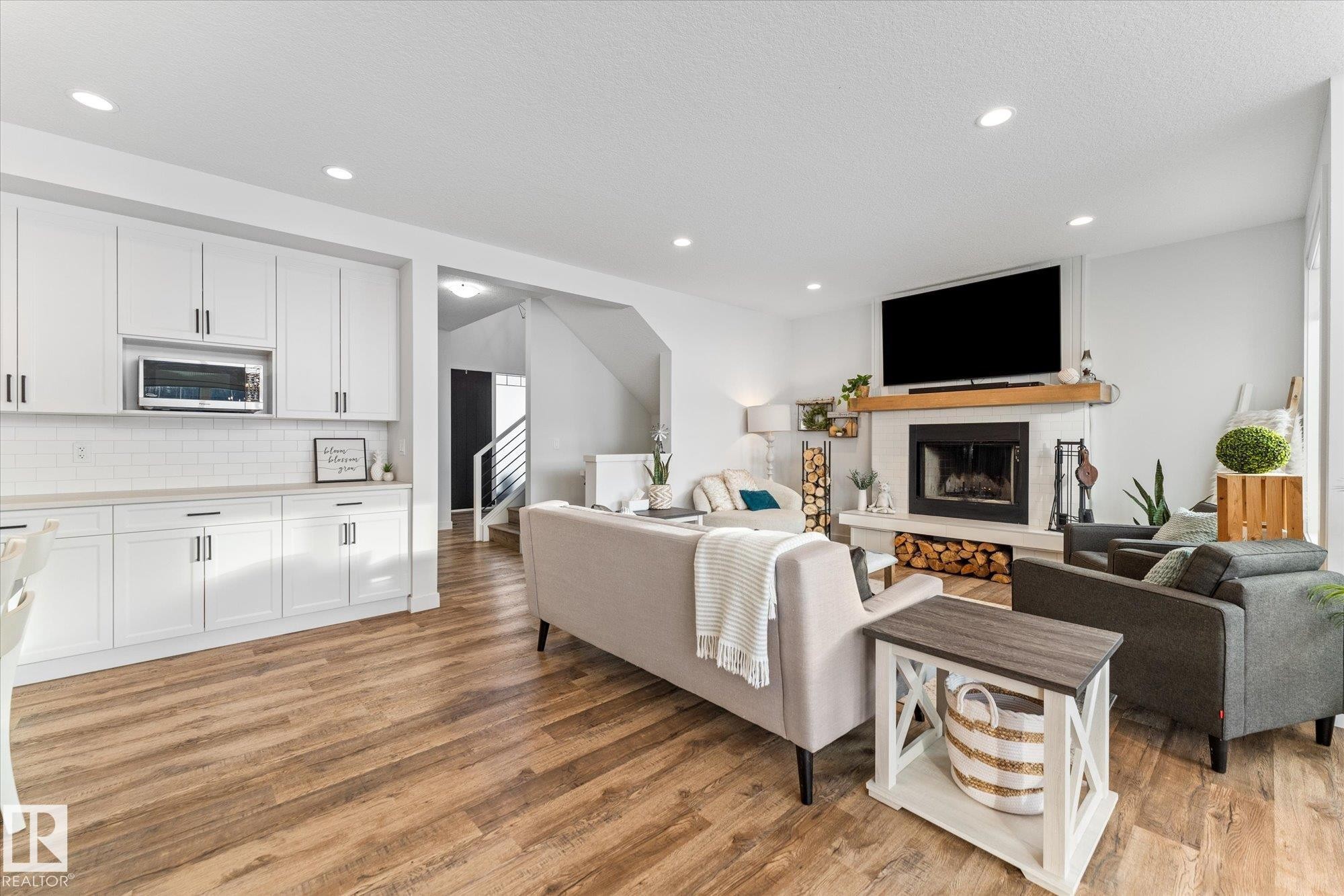 18 3410 Ste. Anne Trail, Rural Lac Ste. Anne County, AB - Indoor Photo Showing Living Room With Fireplace