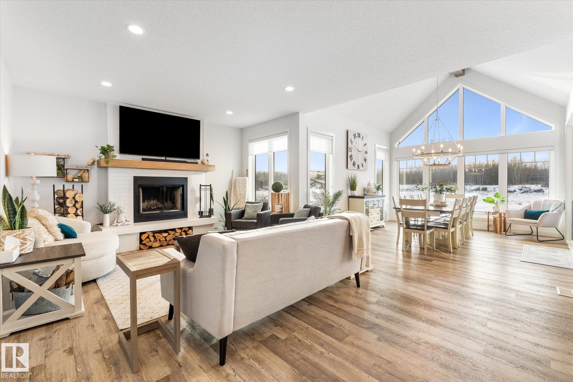 18 3410 Ste. Anne Trail, Rural Lac Ste. Anne County, AB - Indoor Photo Showing Living Room With Fireplace