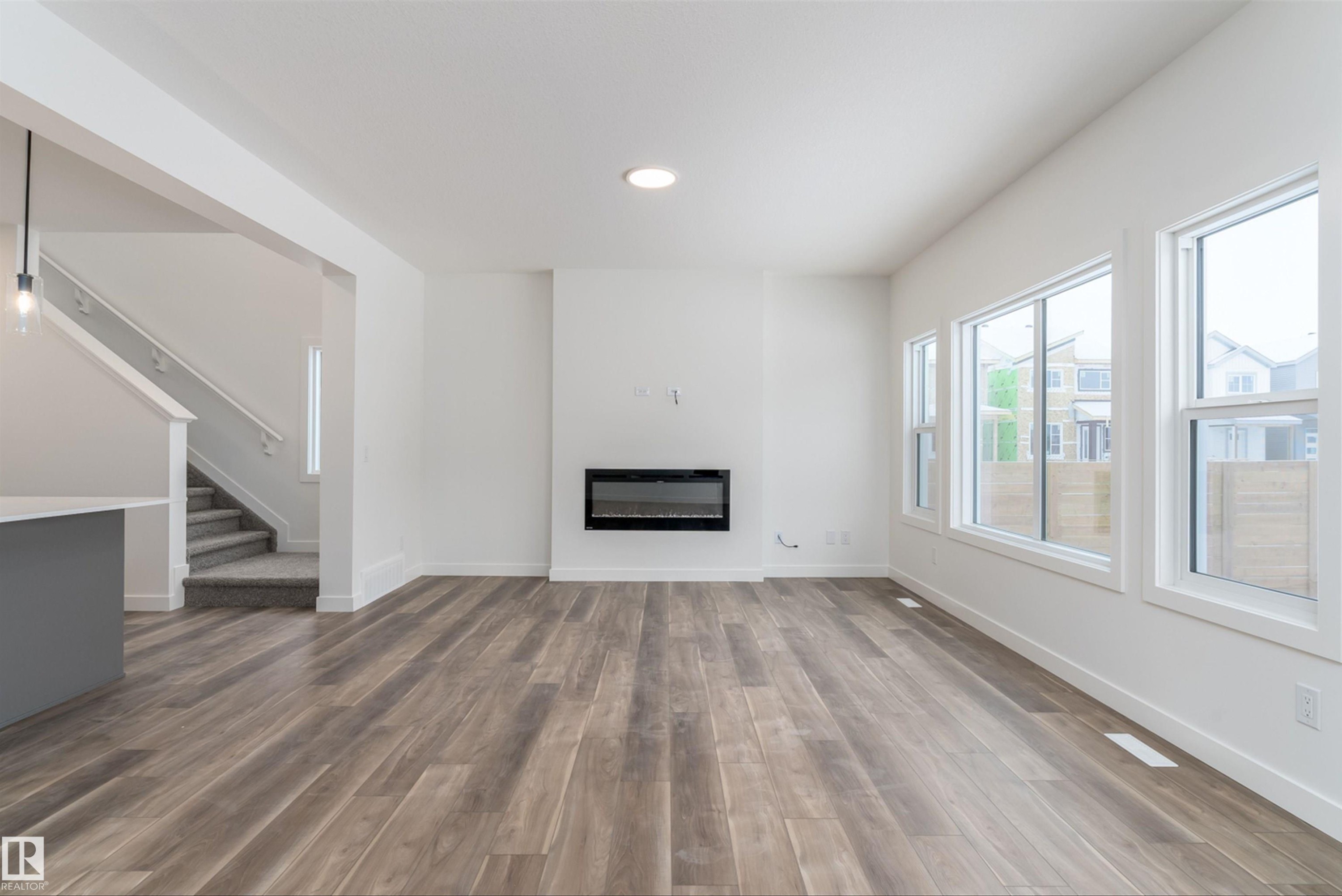 1 Empress Way, Spruce Grove, AB - Indoor With Fireplace