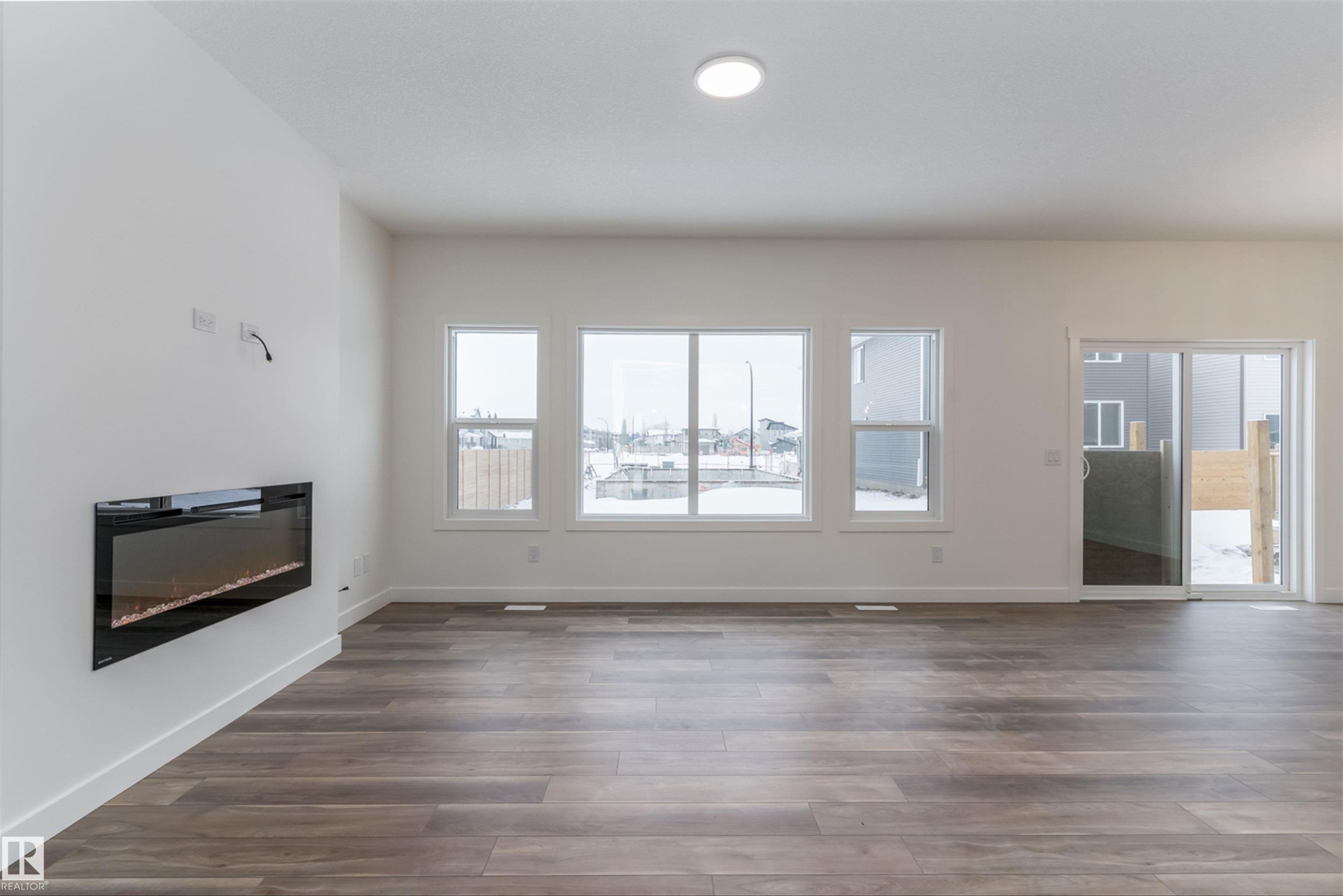 1 Empress Way, Spruce Grove, AB - Indoor With Fireplace