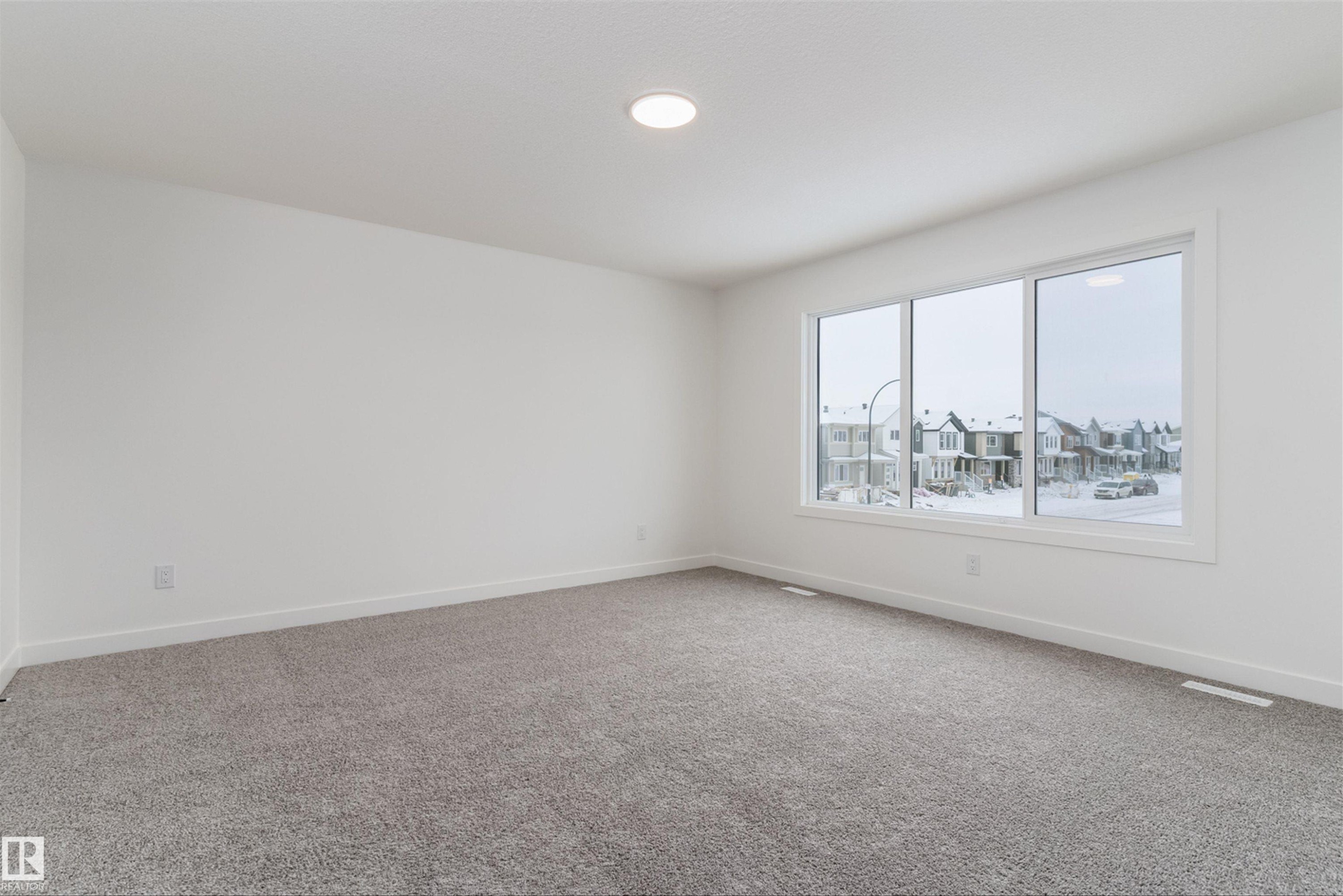 1 Empress Way, Spruce Grove, AB - Indoor Photo Showing Other Room