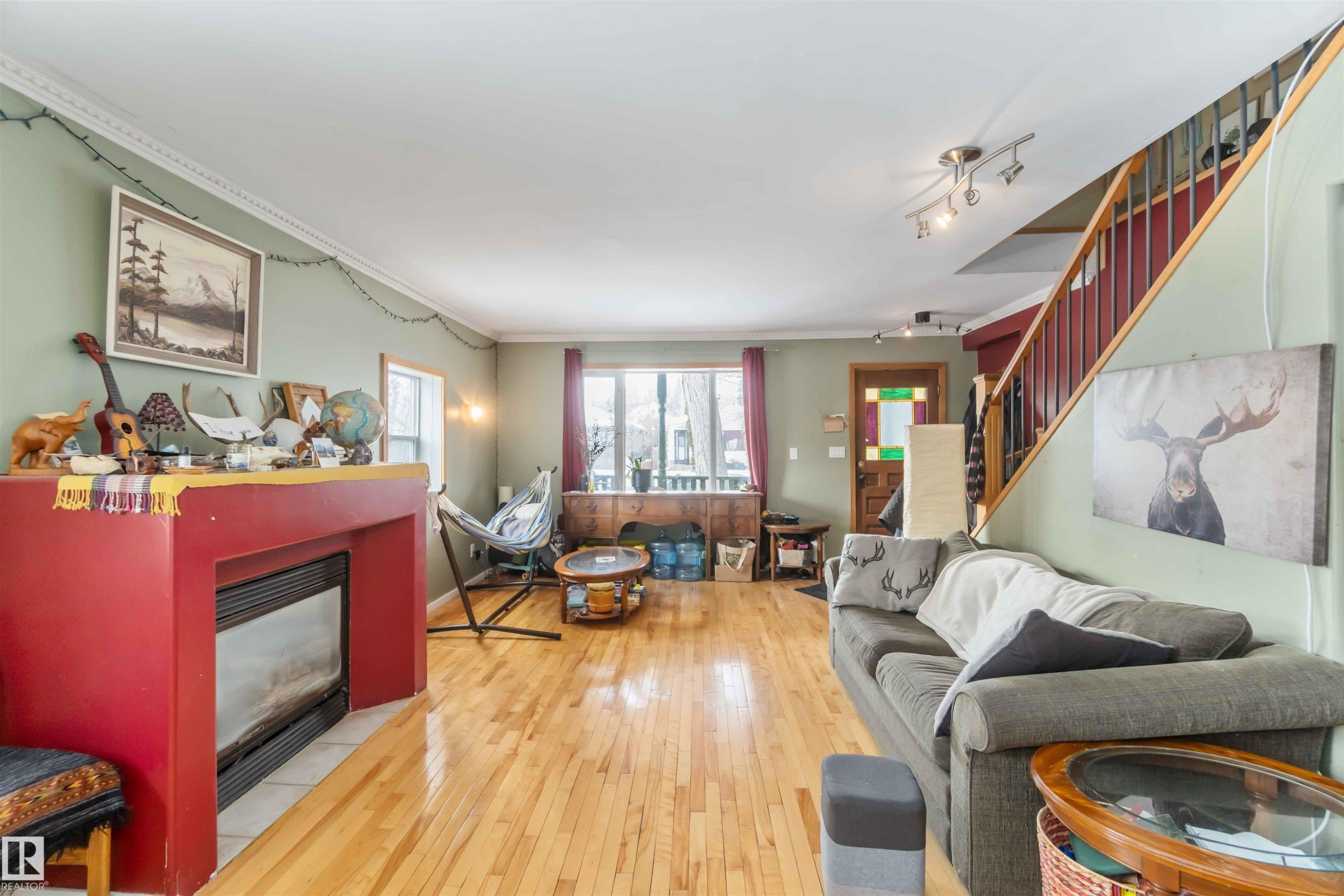 10207 88 Street, Edmonton, AB - Indoor Photo Showing Living Room With Fireplace