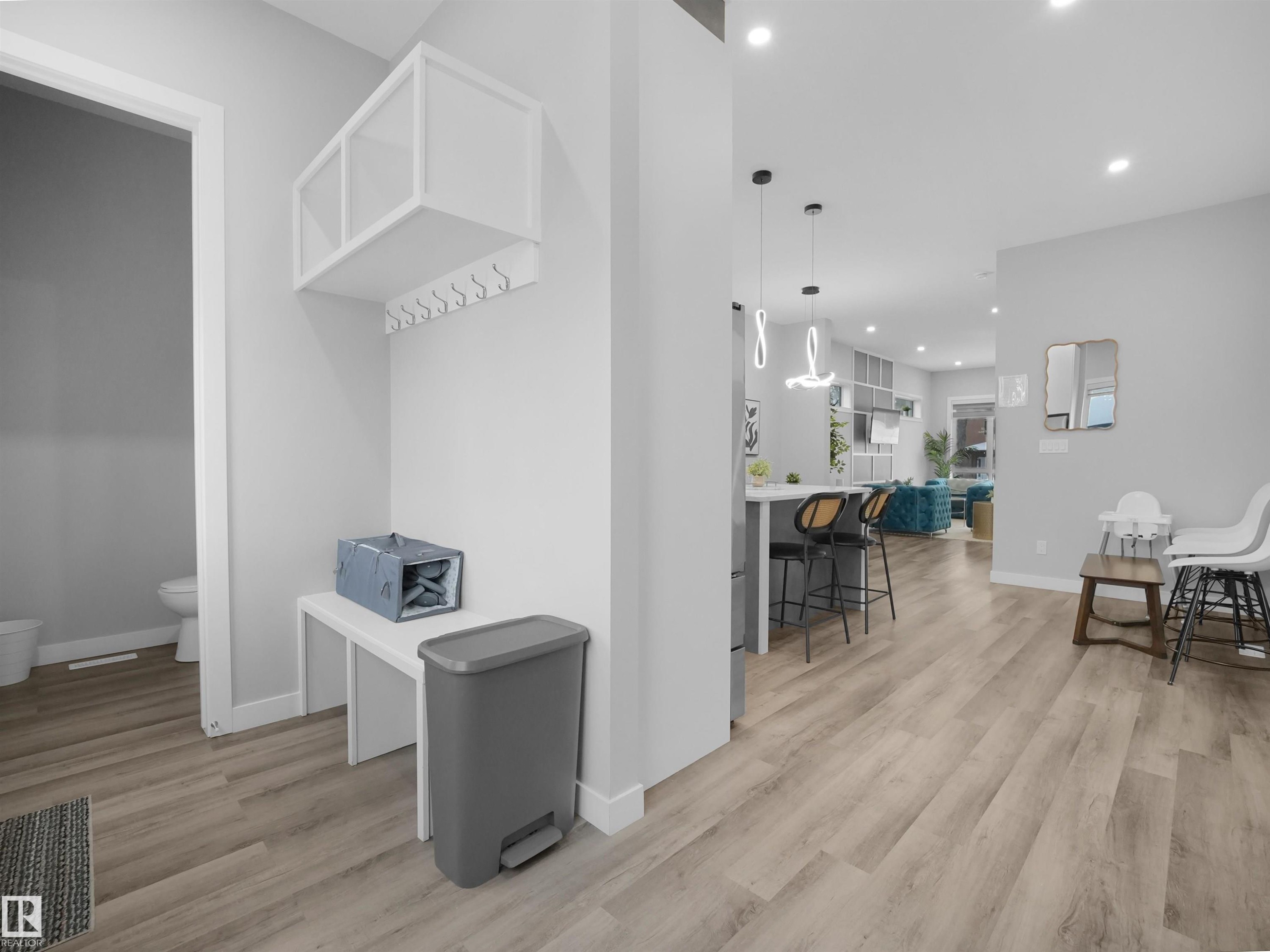 Hall with light wood-style floors and recessed lighting - 10911 159 Street, Edmonton, AB - Indoor Photo Showing Other Room