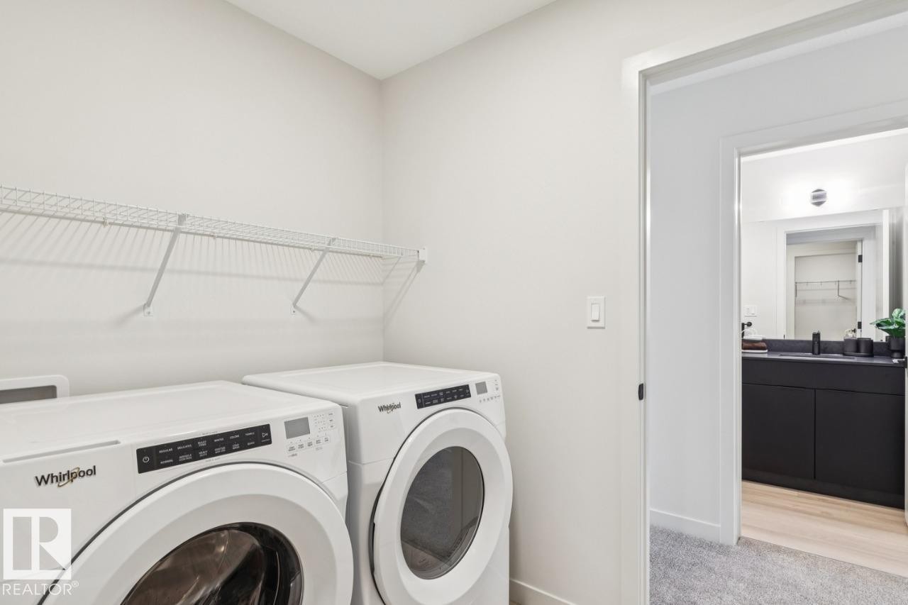 5105 69 Street, Beaumont, AB - Indoor Photo Showing Laundry Room