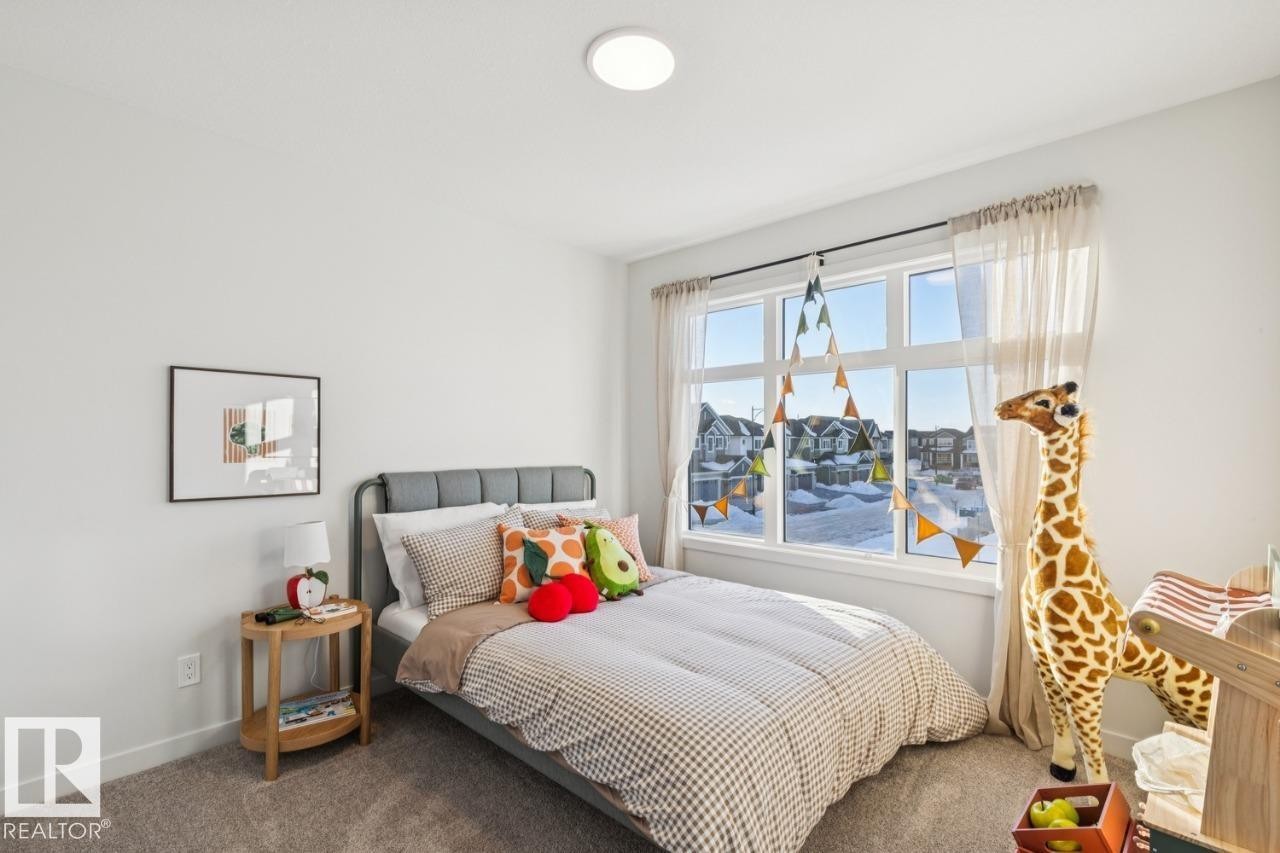 5105 69 Street, Beaumont, AB - Indoor Photo Showing Bedroom