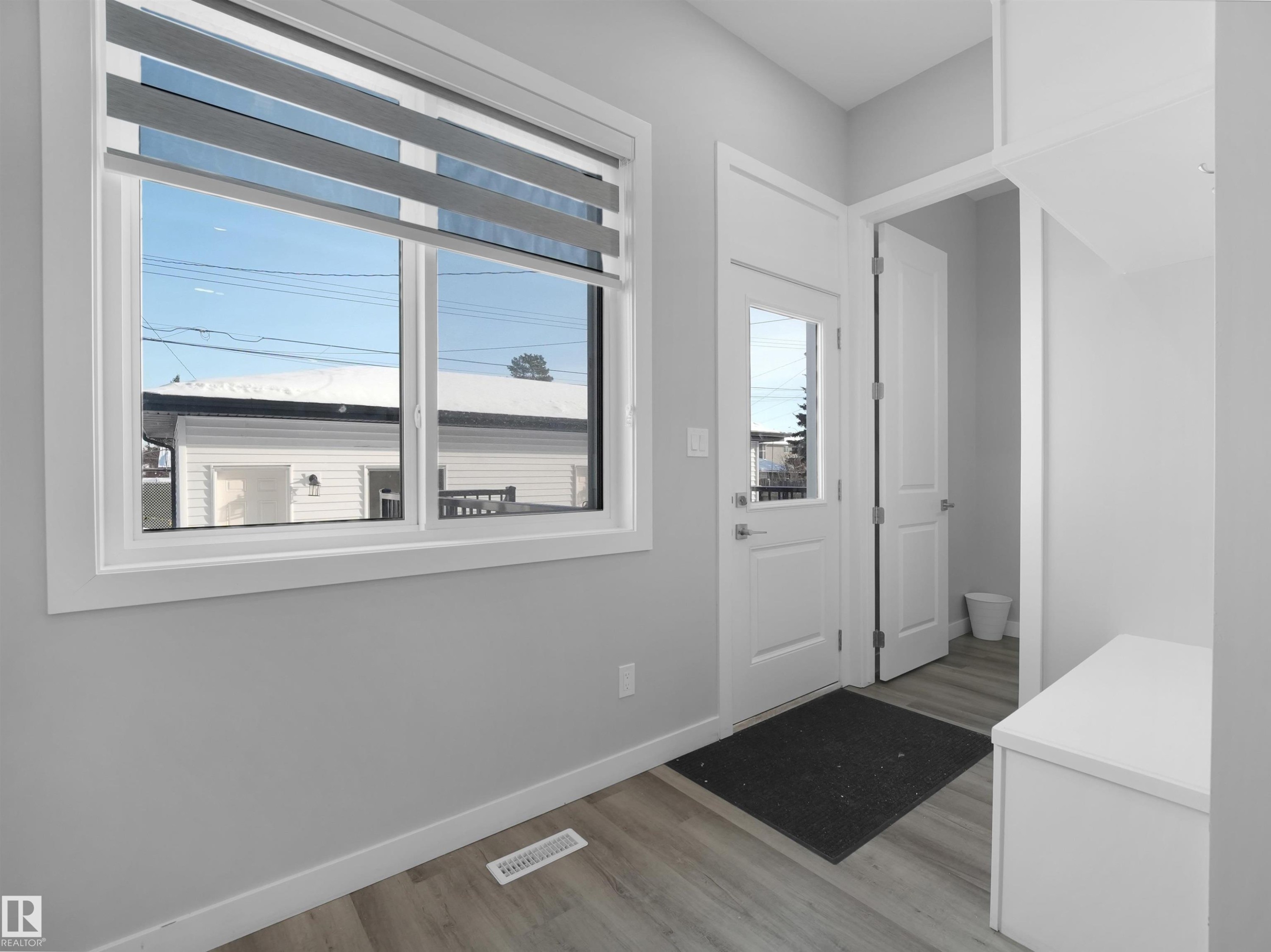 Doorway to outside featuring wood finished floors - 10913 159 Street, Edmonton, AB - Indoor Photo Showing Other Room