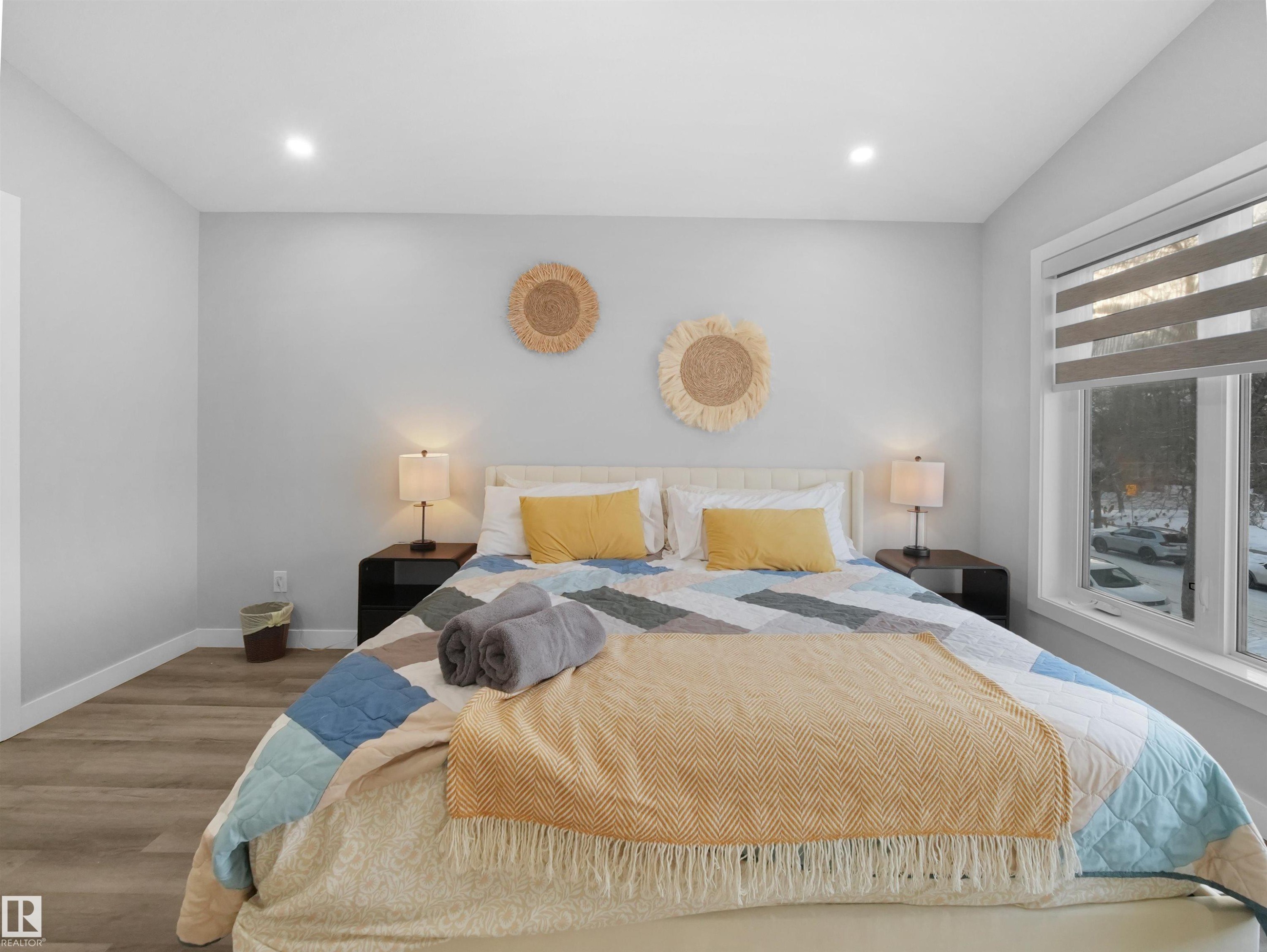 Bedroom featuring wood finished floors and recessed lighting - 10913 159 Street, Edmonton, AB - Indoor Photo Showing Bedroom