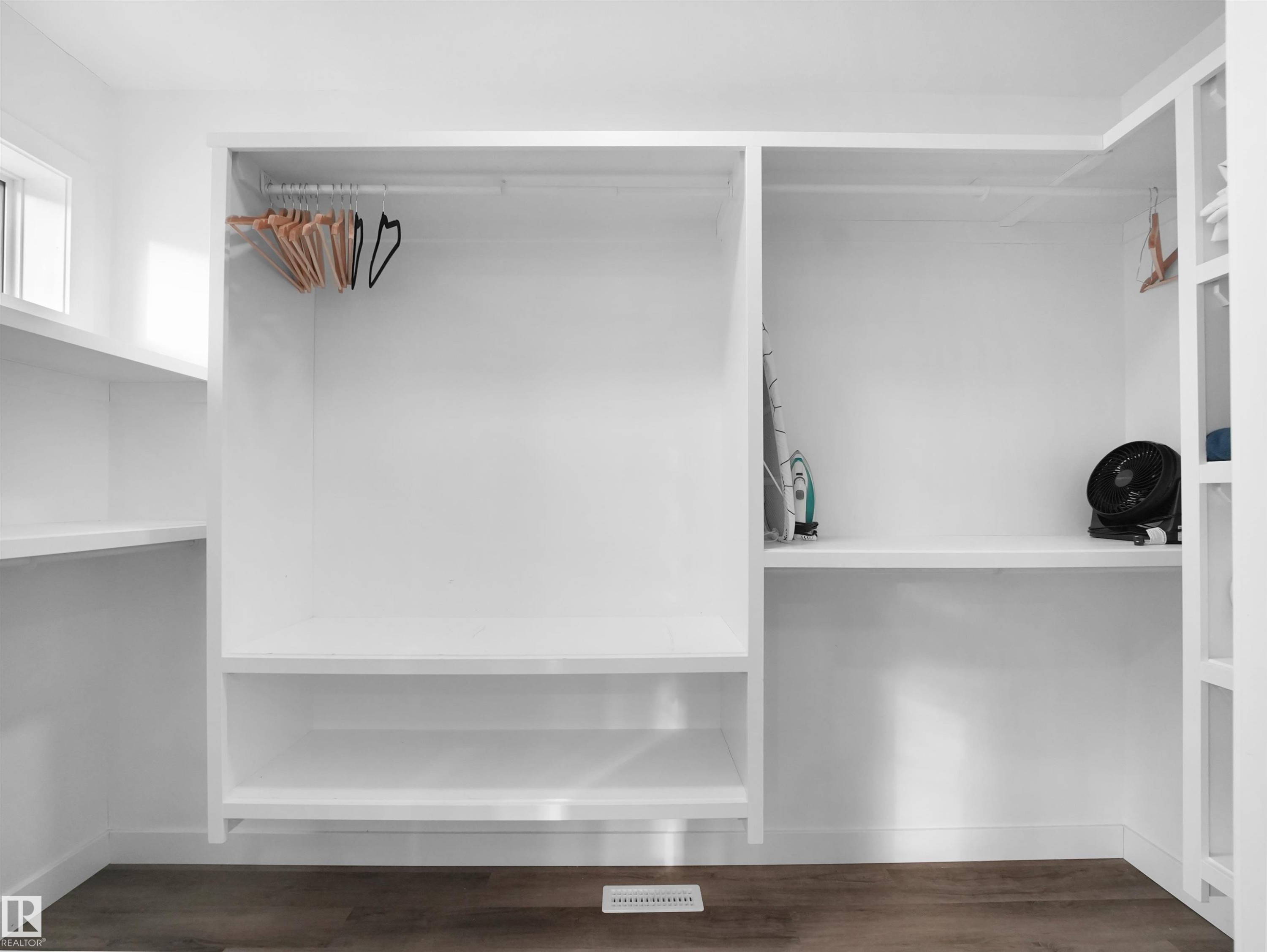 Spacious closet with dark wood-style flooring - 10913 159 Street, Edmonton, AB - Indoor With Storage