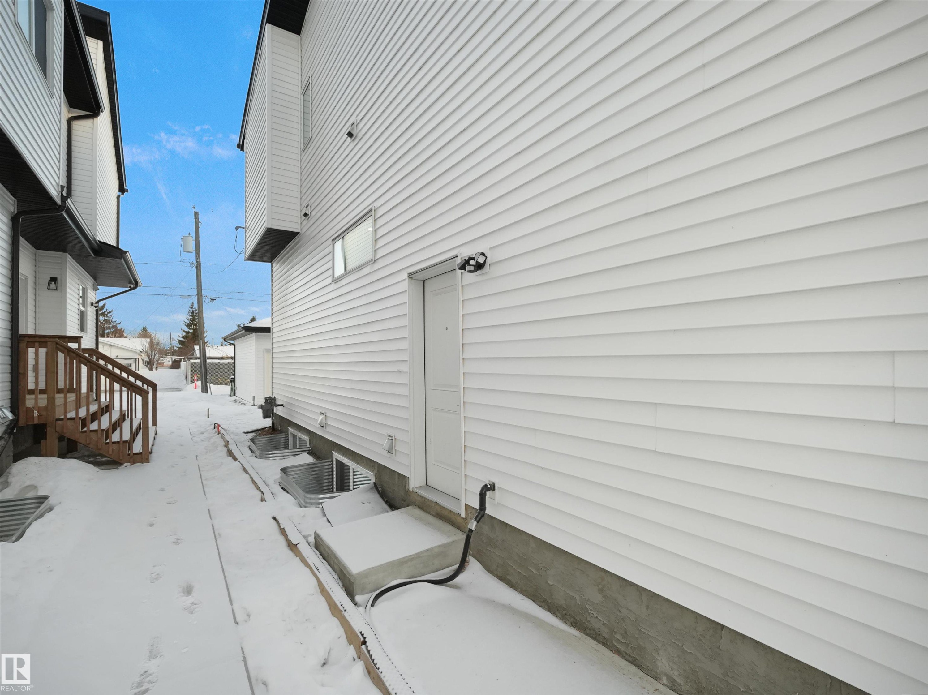 View of snowy exterior - 10913 159 Street, Edmonton, AB - Outdoor With Exterior