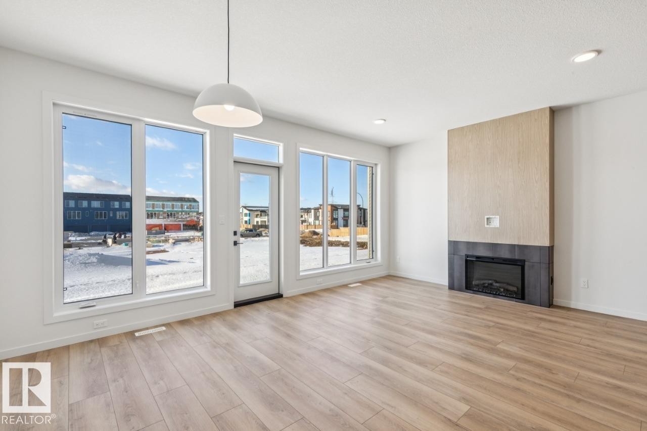 320 30 Street, Edmonton, AB - Indoor Photo Showing Living Room With Fireplace
