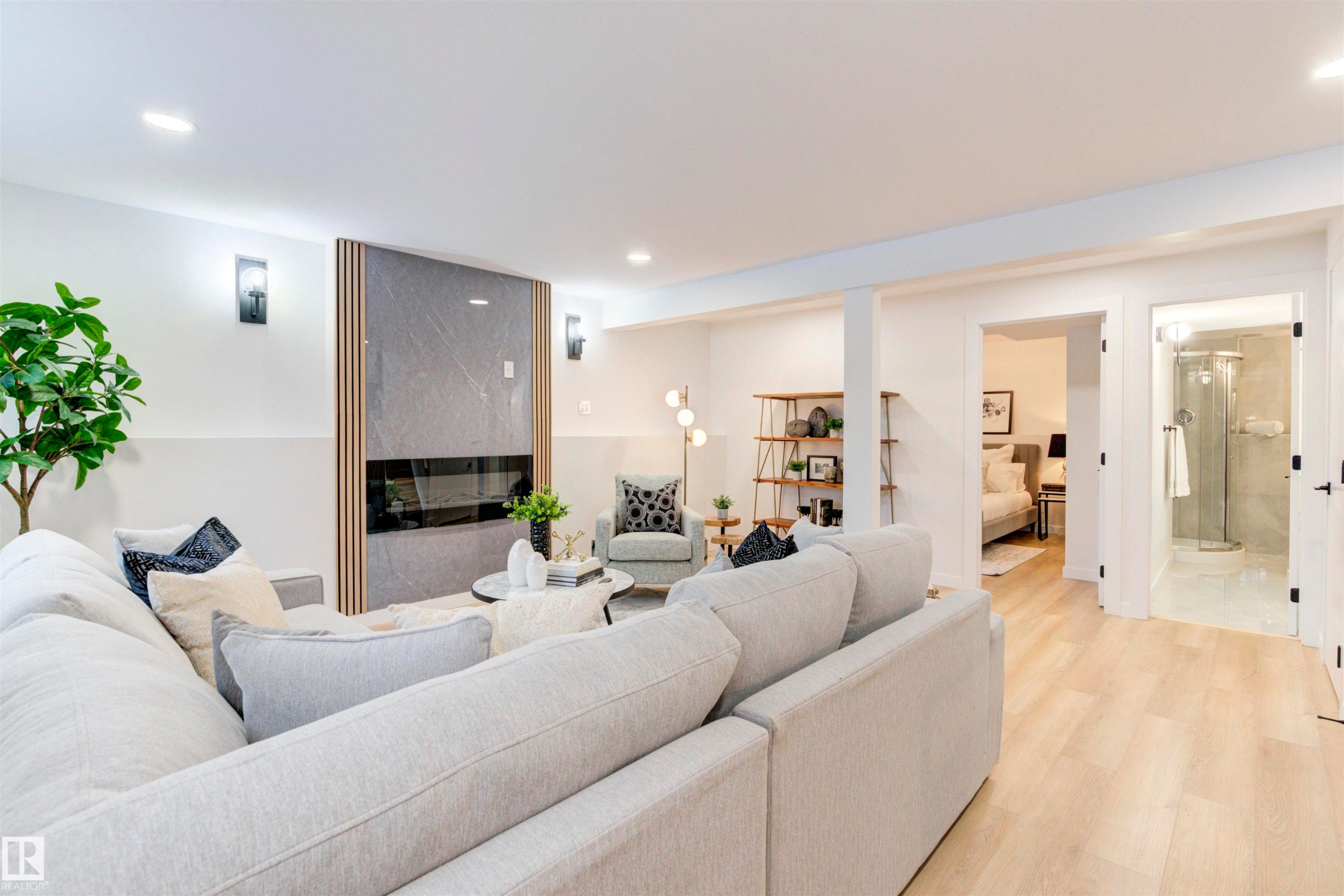 2712 41 Street, Edmonton, AB - Indoor Photo Showing Living Room With Fireplace