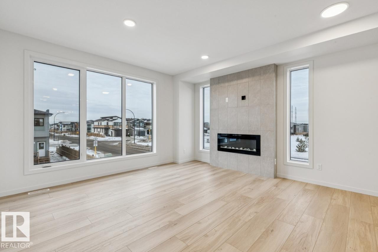 2604 Alces Way, Edmonton, AB - Indoor Photo Showing Living Room With Fireplace