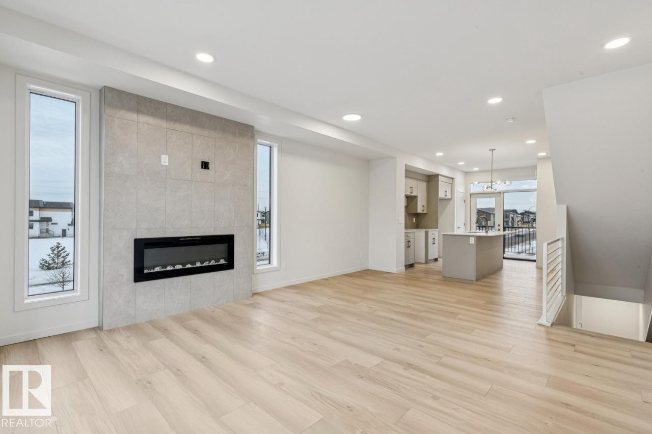 2604 Alces Way, Edmonton, AB - Indoor Photo Showing Living Room With Fireplace