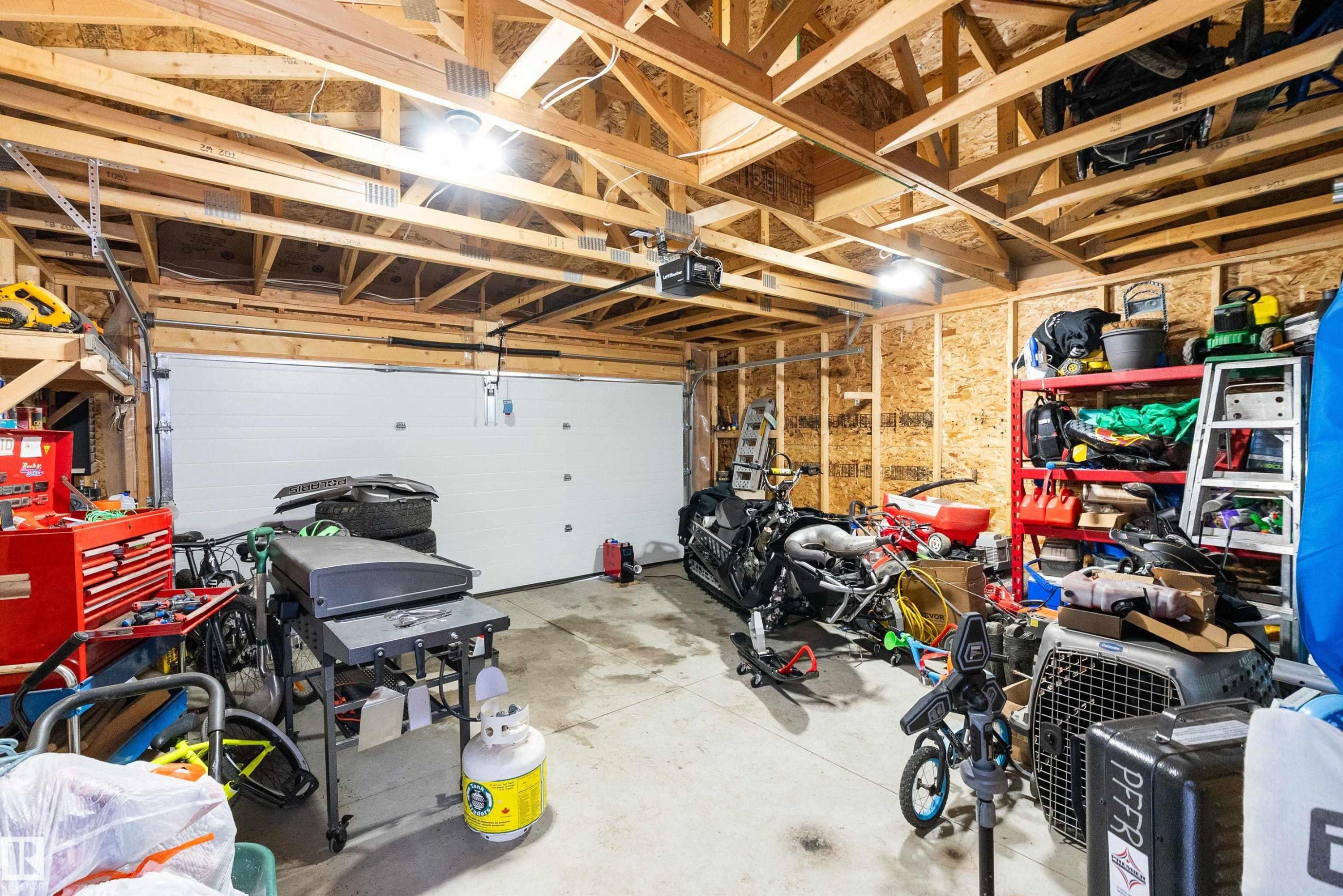 17 Emerald Way, Spruce Grove, AB - Indoor Photo Showing Garage