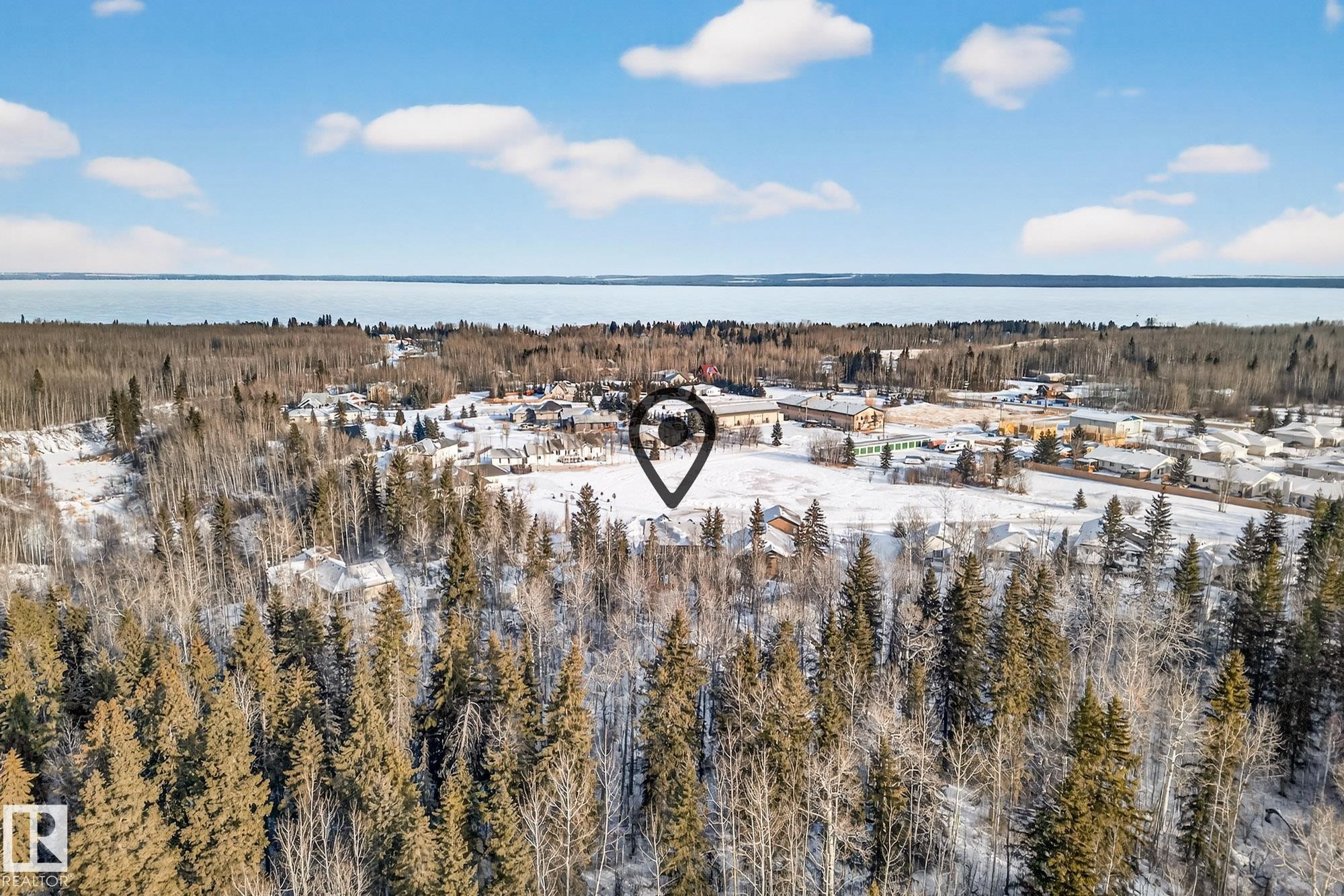 Aerial view of property and surrounding area featuring a large body of water - 132 Heron Point Close, Rural Wetaskiwin County, AB - Outdoor With Body Of Water With View
