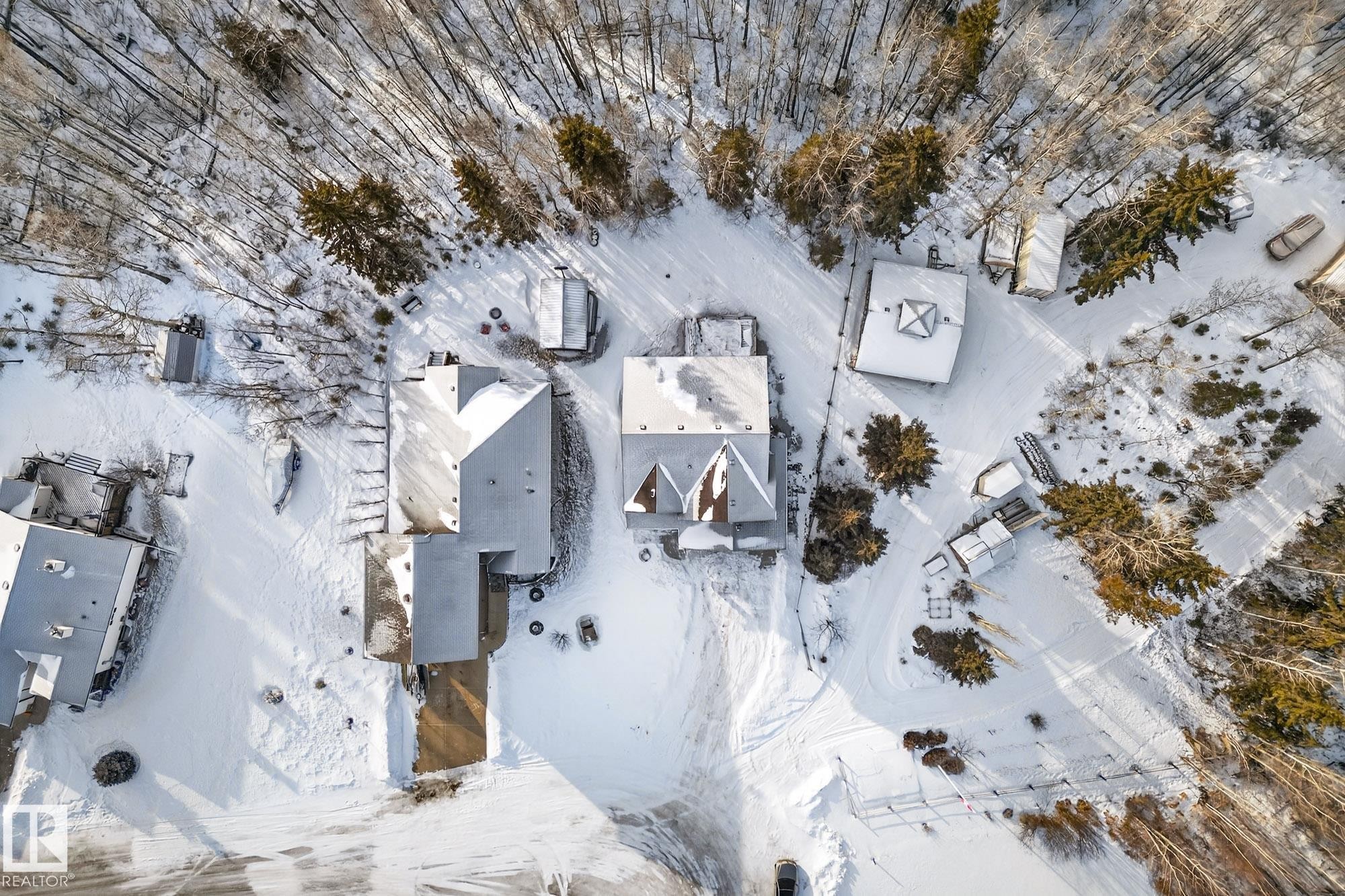 View of snowy aerial view - 132 Heron Point Close, Rural Wetaskiwin County, AB - Outdoor With View