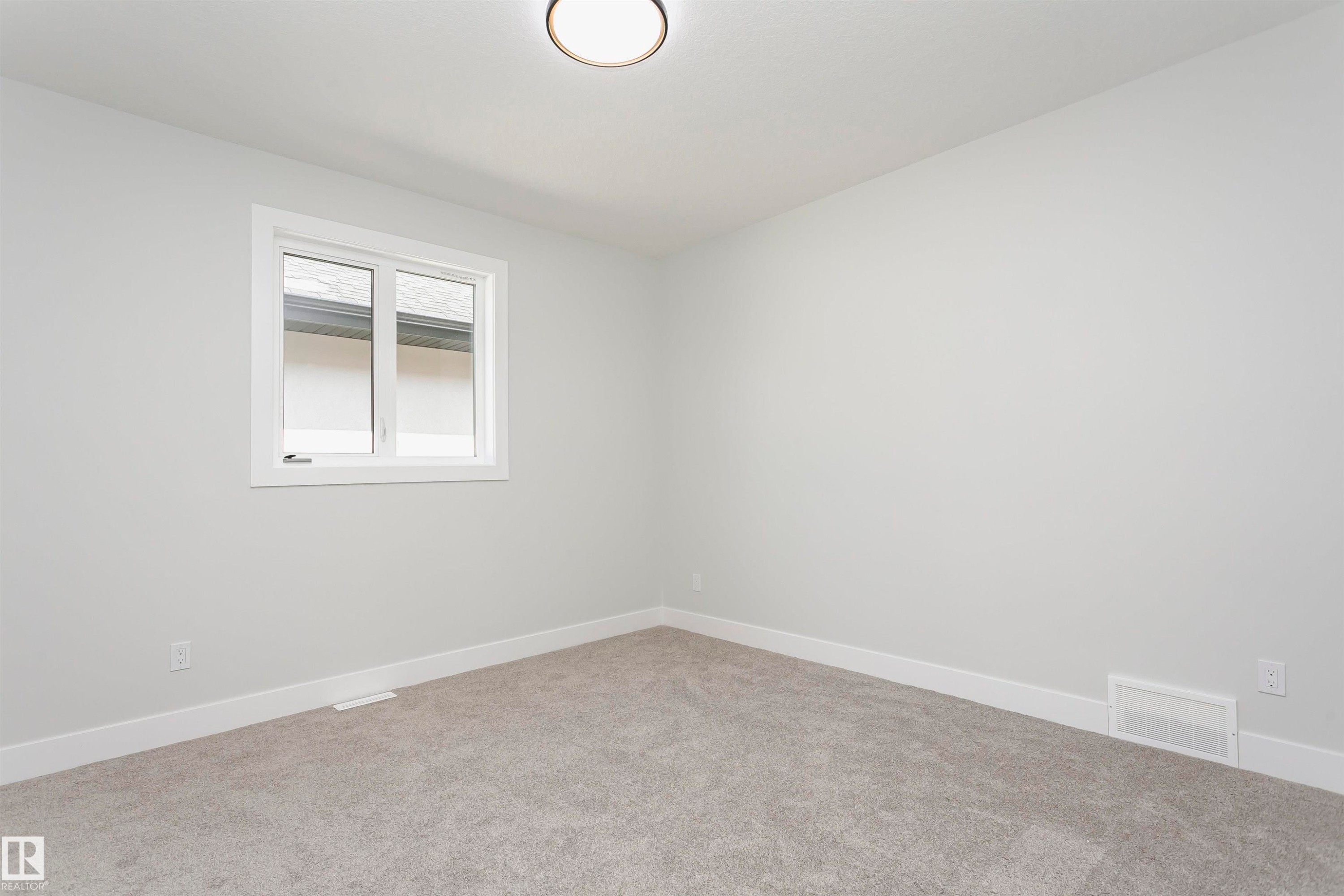 Unfurnished room with baseboards and carpet floors - 1723 19 Street, Edmonton, AB - Indoor Photo Showing Other Room