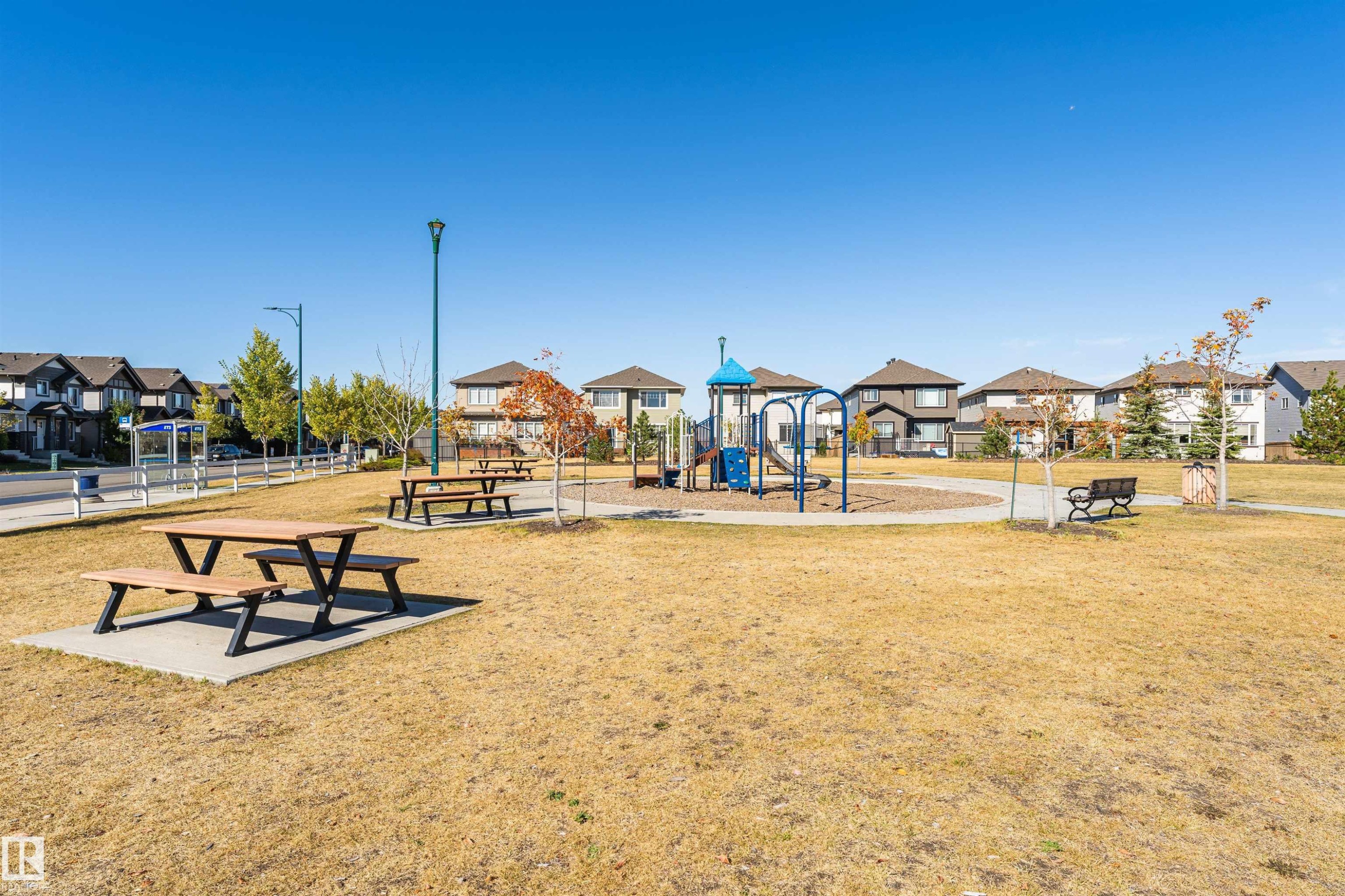 Community play area featuring a residential view and a yard - 1723 19 Street, Edmonton, AB - Outdoor