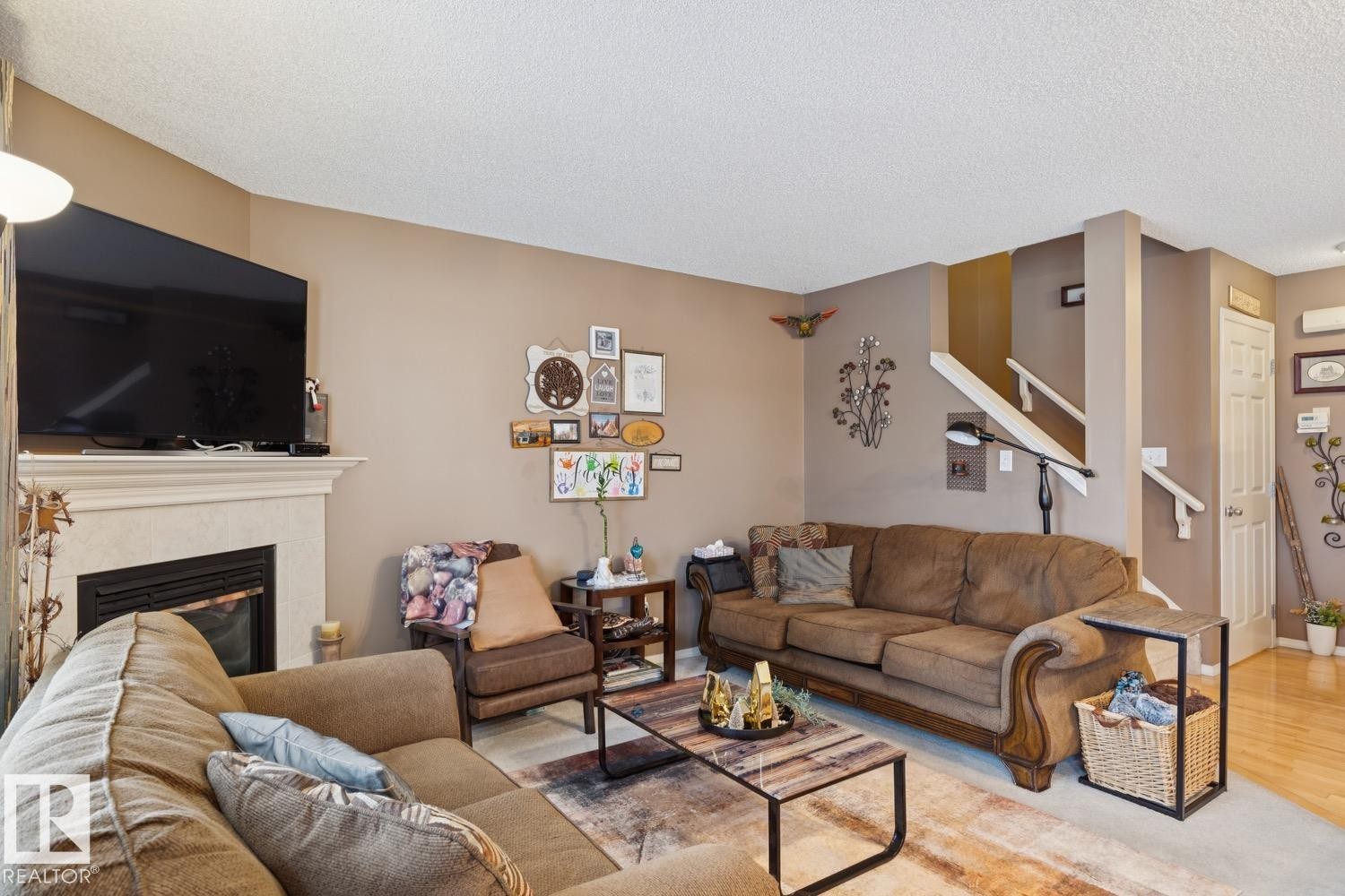5 4020 21 Street, Edmonton, AB - Indoor Photo Showing Living Room With Fireplace