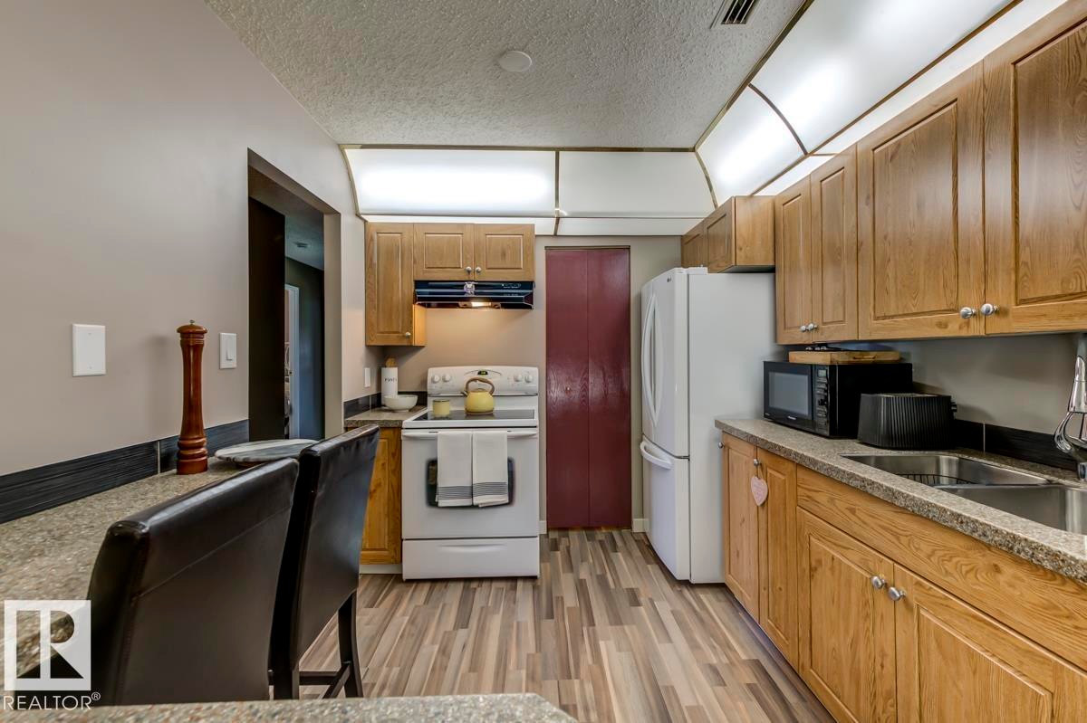 2346 151 Avenue, Edmonton, AB - Indoor Photo Showing Kitchen With Double Sink