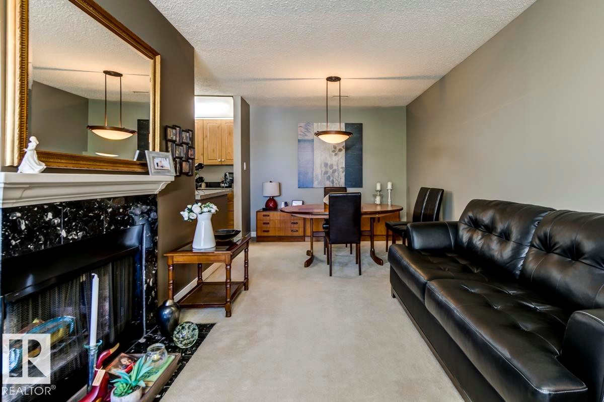 2346 151 Avenue, Edmonton, AB - Indoor Photo Showing Living Room With Fireplace