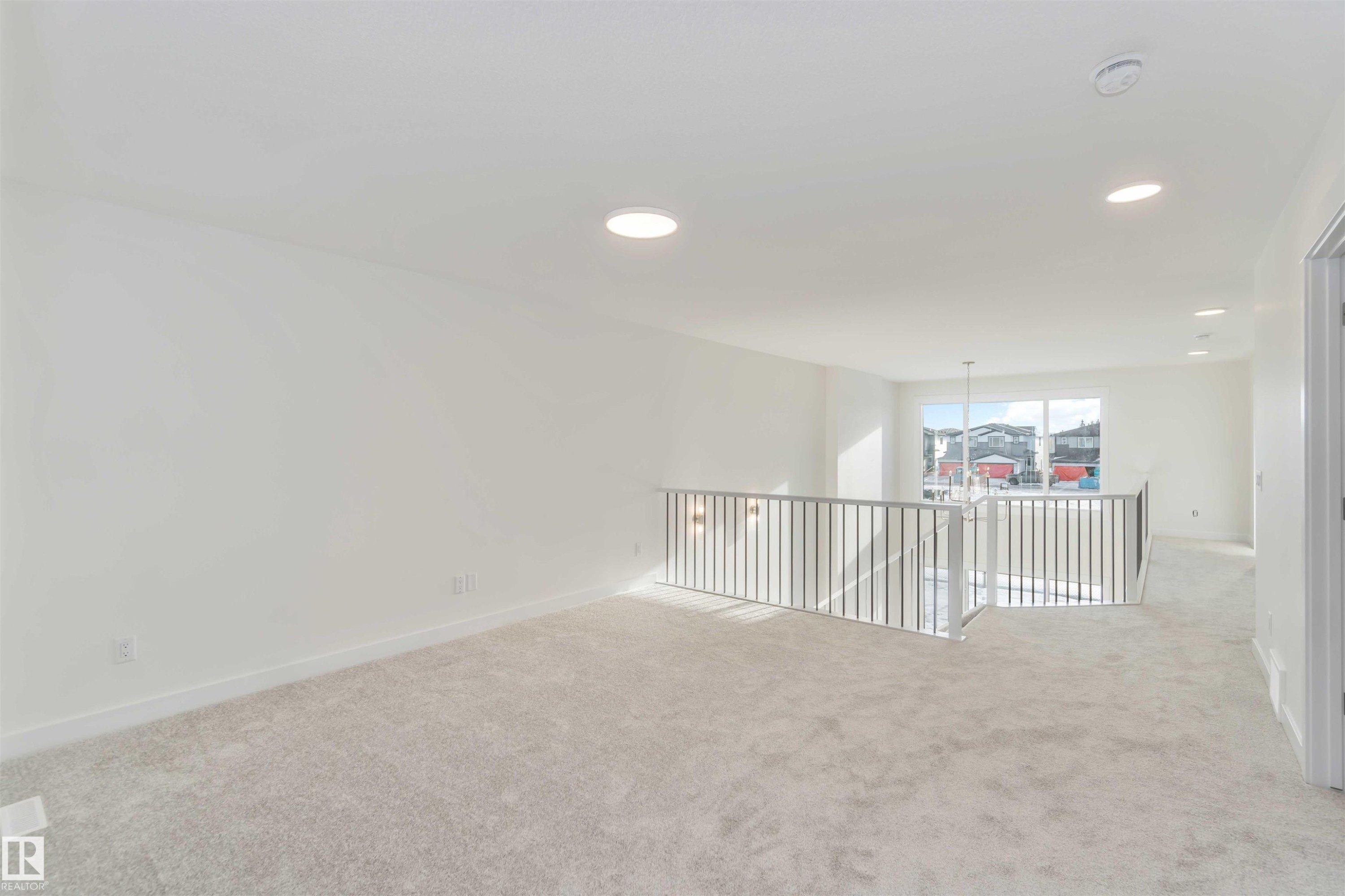 Unfurnished room with carpet floors and recessed lighting - 2215 4 Avenue, Edmonton, AB - Indoor Photo Showing Other Room