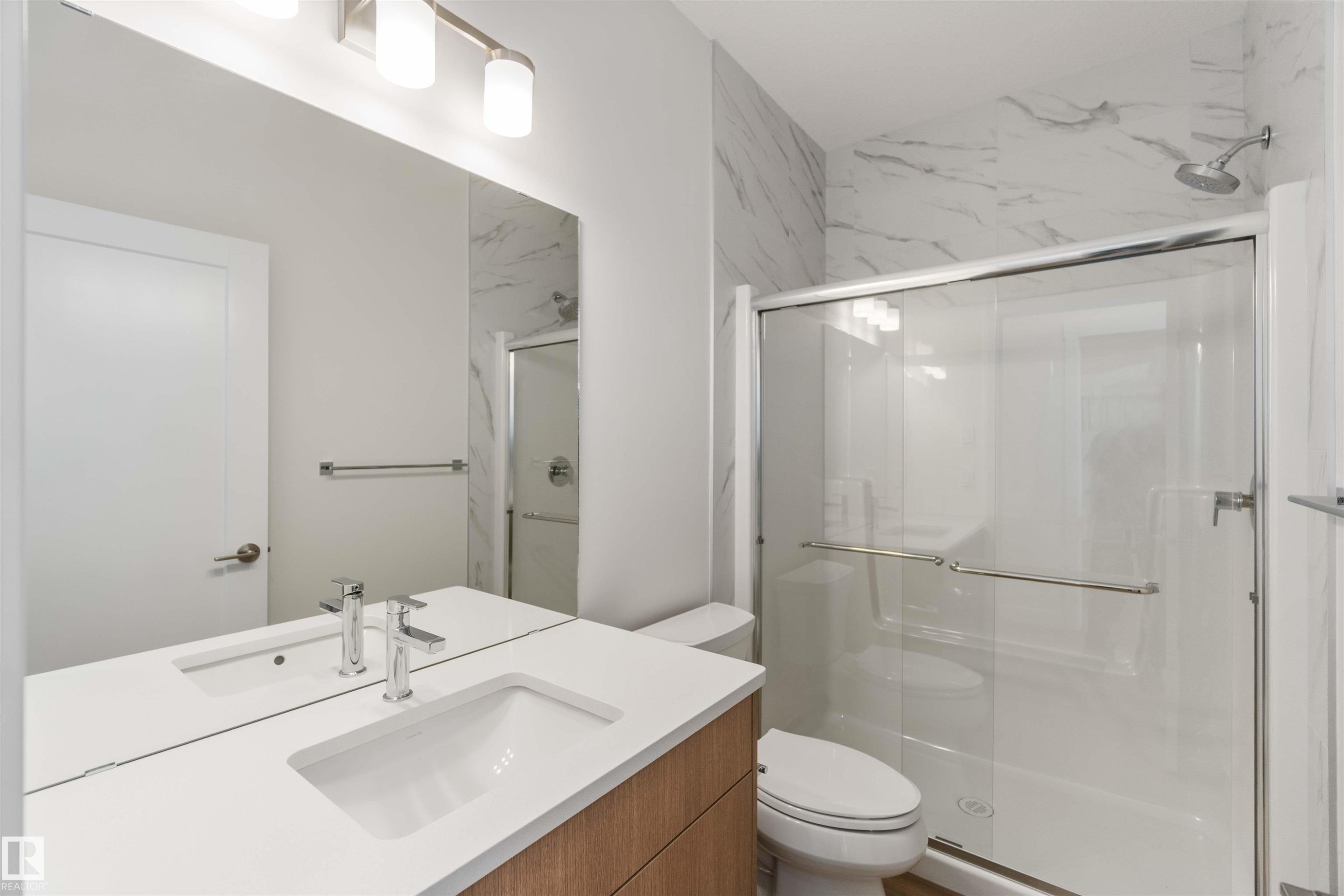 Full bathroom with a shower stall and vanity - 2215 4 Avenue, Edmonton, AB - Indoor Photo Showing Bathroom