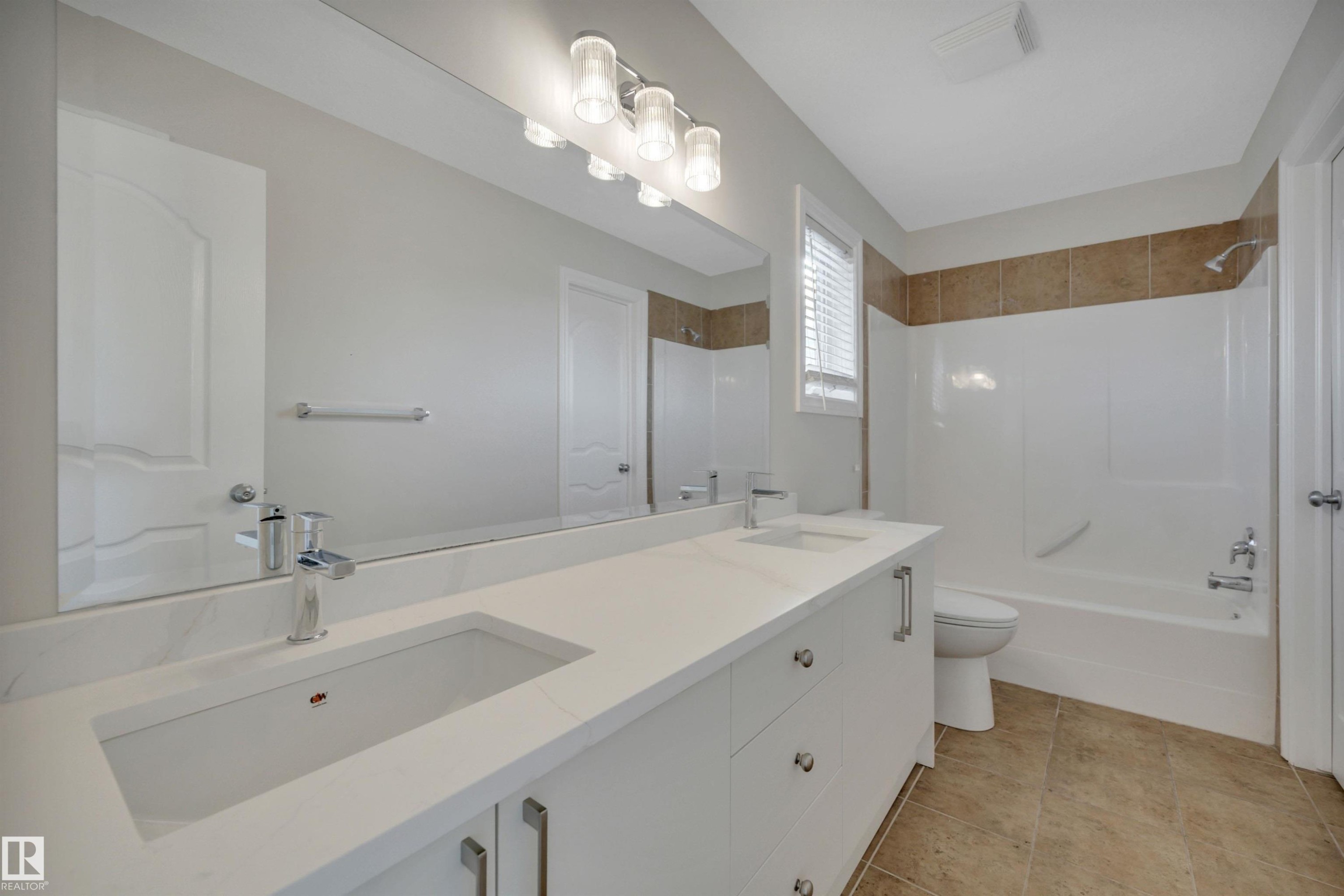 Bathroom with double vanity and shower / tub combination - 457 Aster Close, Leduc, AB - Indoor Photo Showing Bathroom