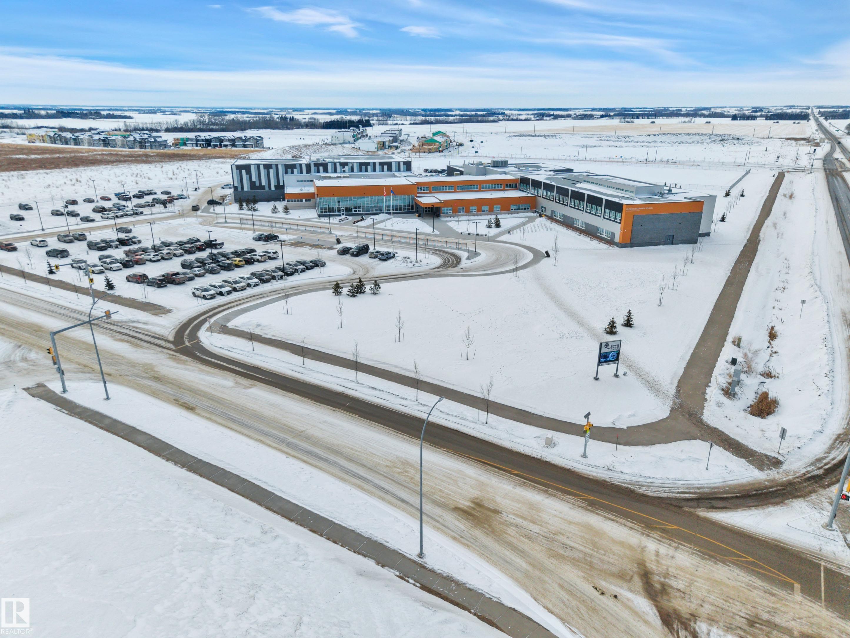 View of snowy aerial view - 457 Aster Close, Leduc, AB - Outdoor With View