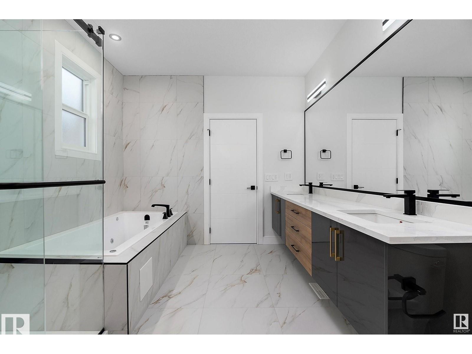 Full bath with double vanity, a bath, light marble finish floors, and recessed lighting - 138 South Ravines Drive, Devon, AB - Indoor