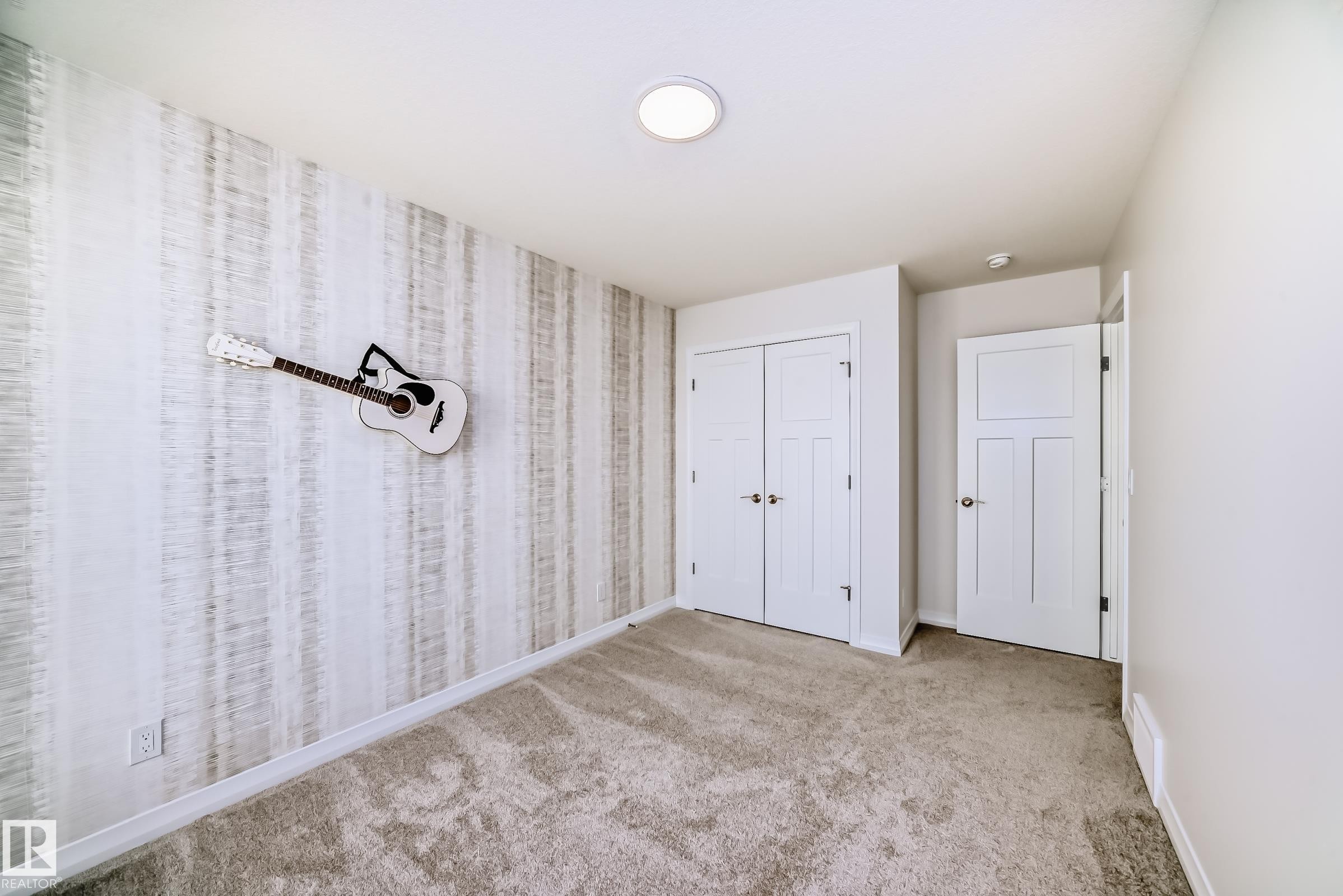 Unfurnished bedroom featuring carpet and a closet - 3249 Dixon Way, Edmonton, AB - Indoor
