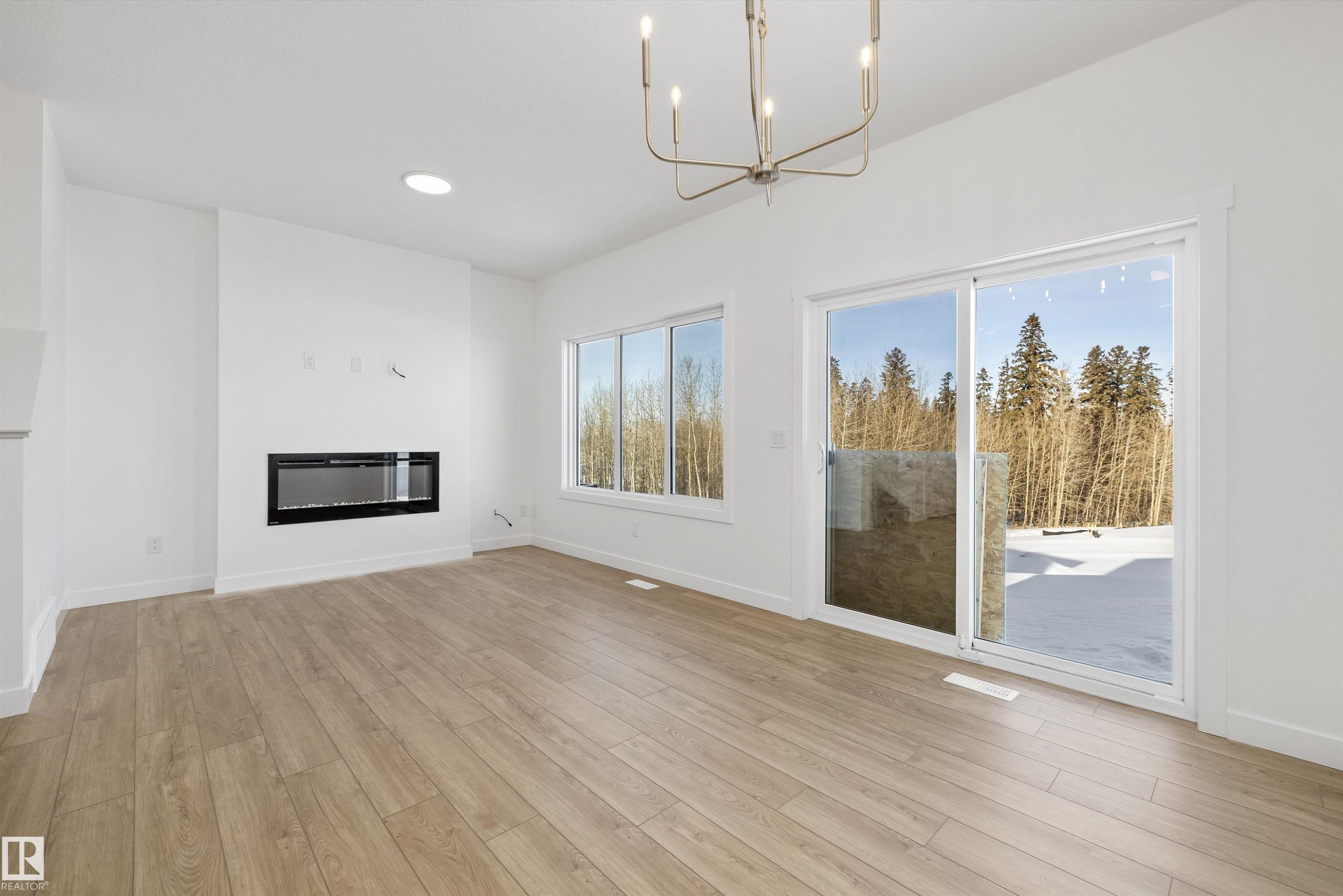 4184 Kinglet Drive, Edmonton, AB - Indoor Photo Showing Living Room With Fireplace