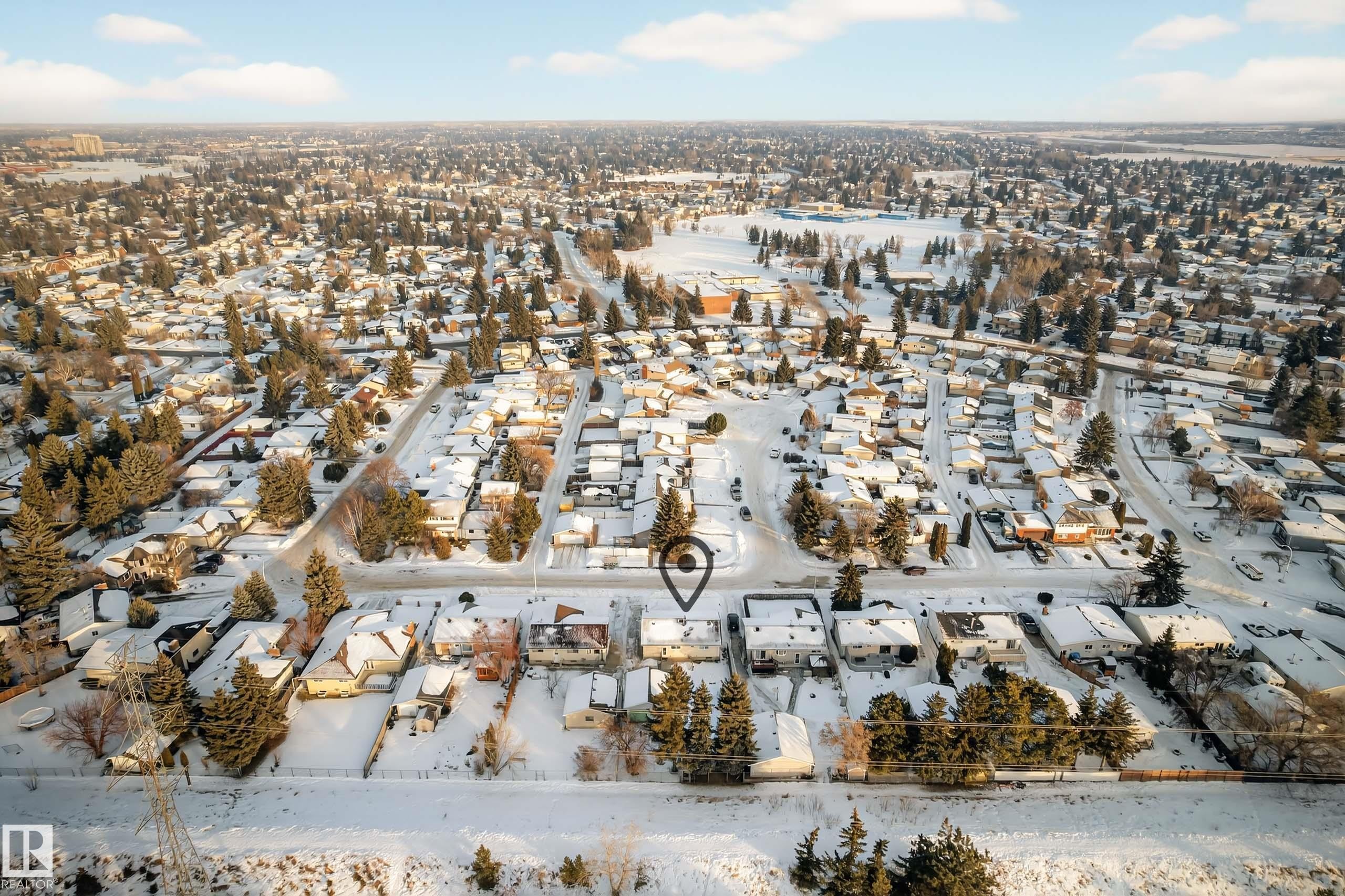 Snowy aerial view featuring a residential view - 1704 89 Street, Edmonton, AB - Outdoor With View